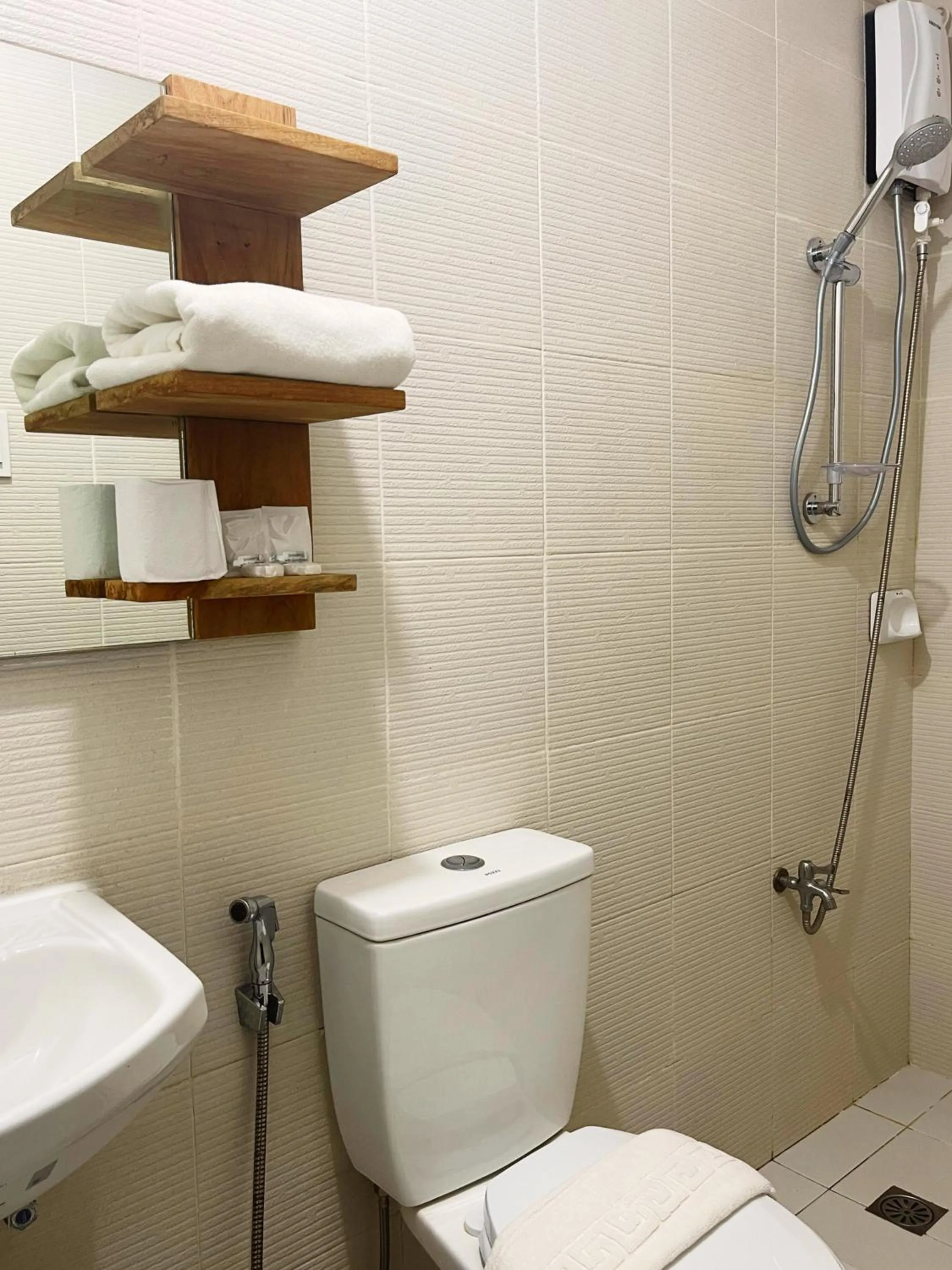 Bathroom in Airo Suites Makati