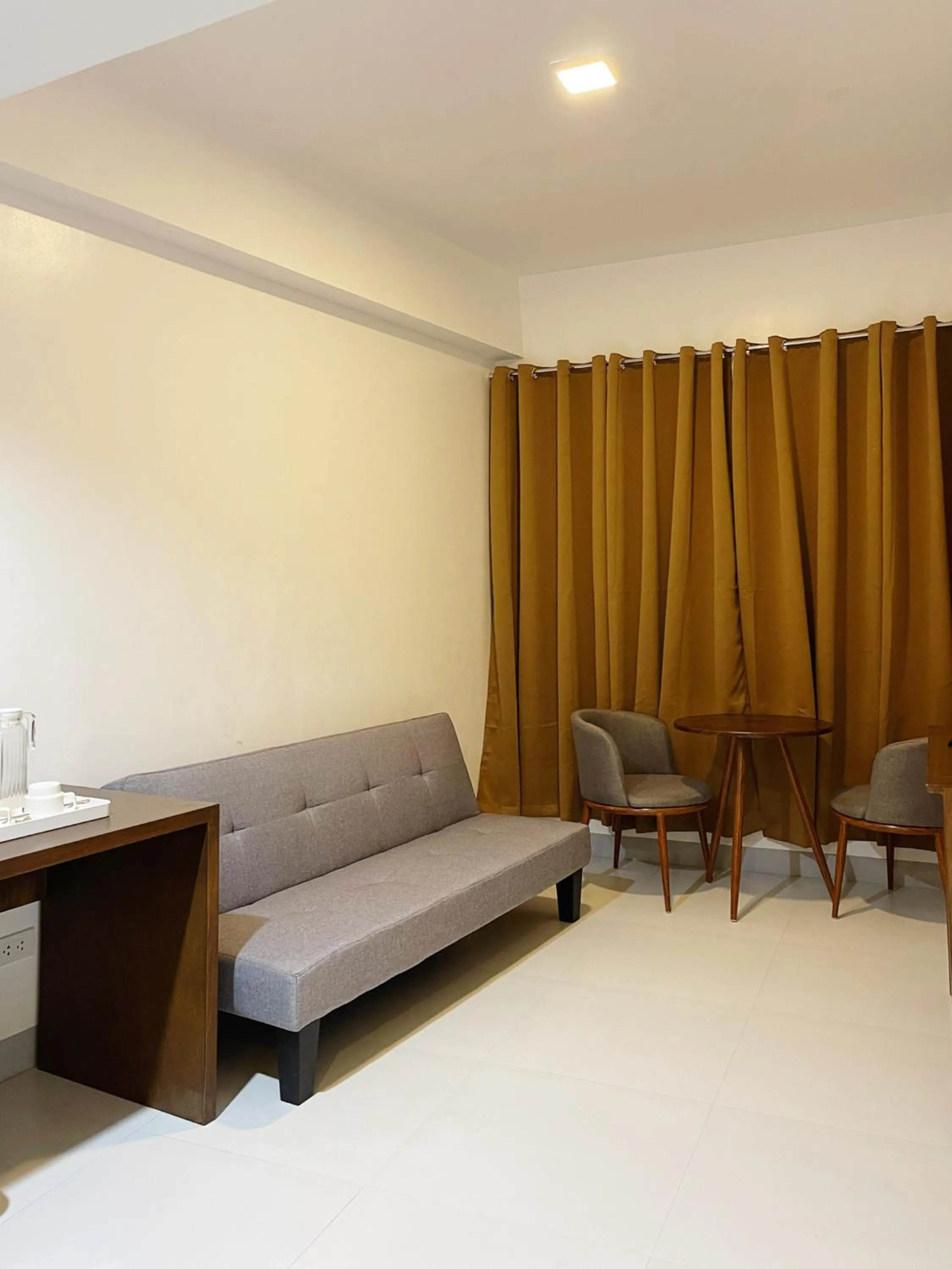 Seating area in Airo Suites Makati