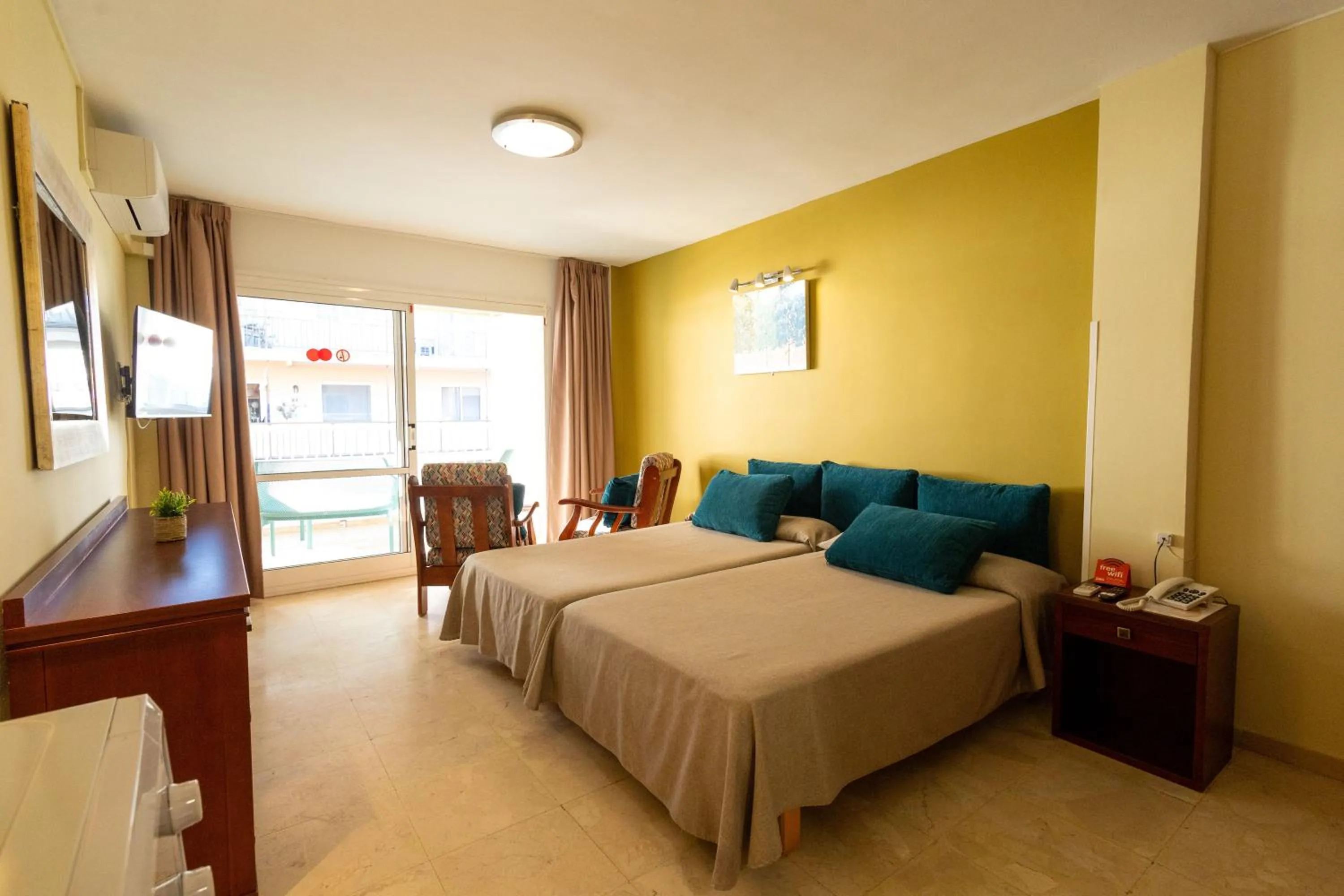 Bed in Apartamentos La Jabega