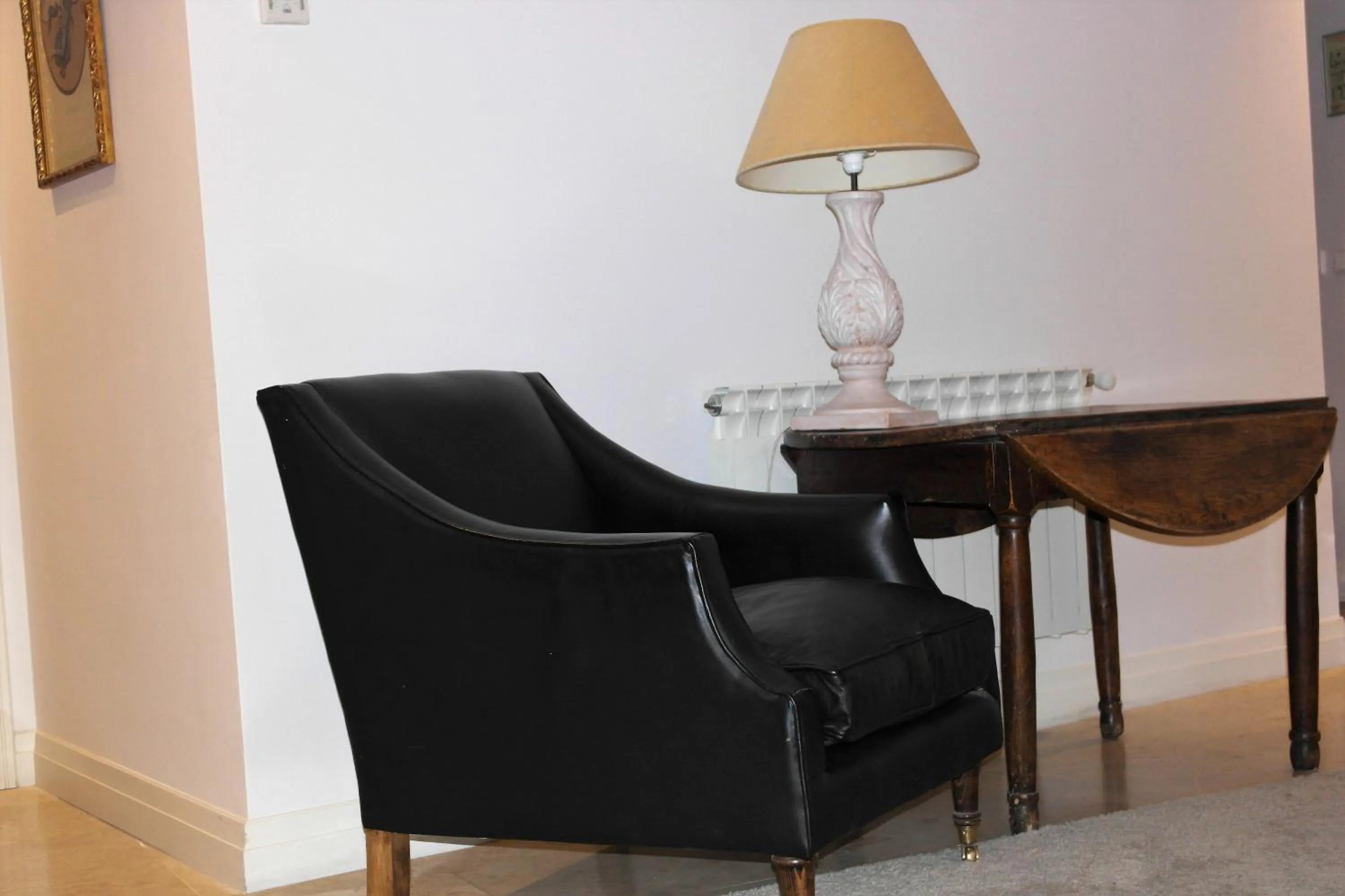 Communal lounge/ TV room in Hotel Cuéntame La Puebla