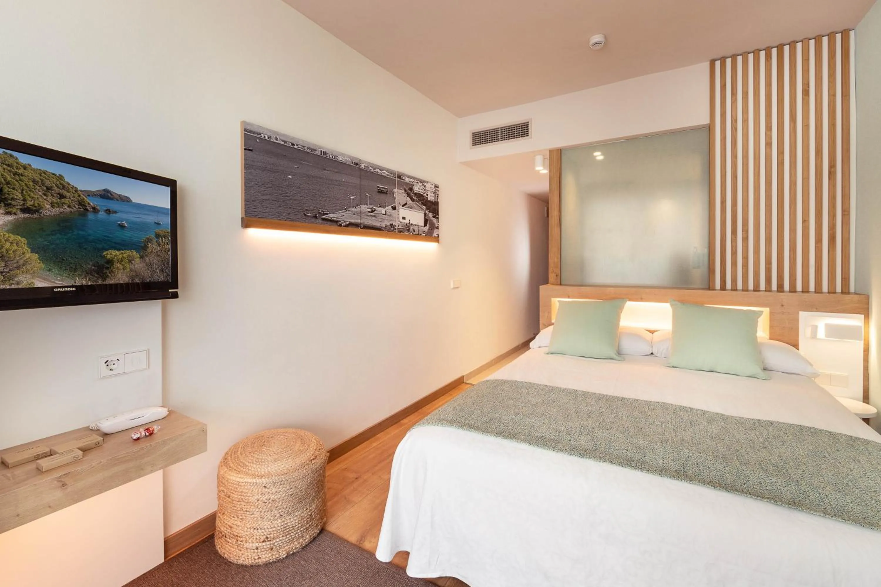 Bed in Hotel Montecarlo Spa & Wellness