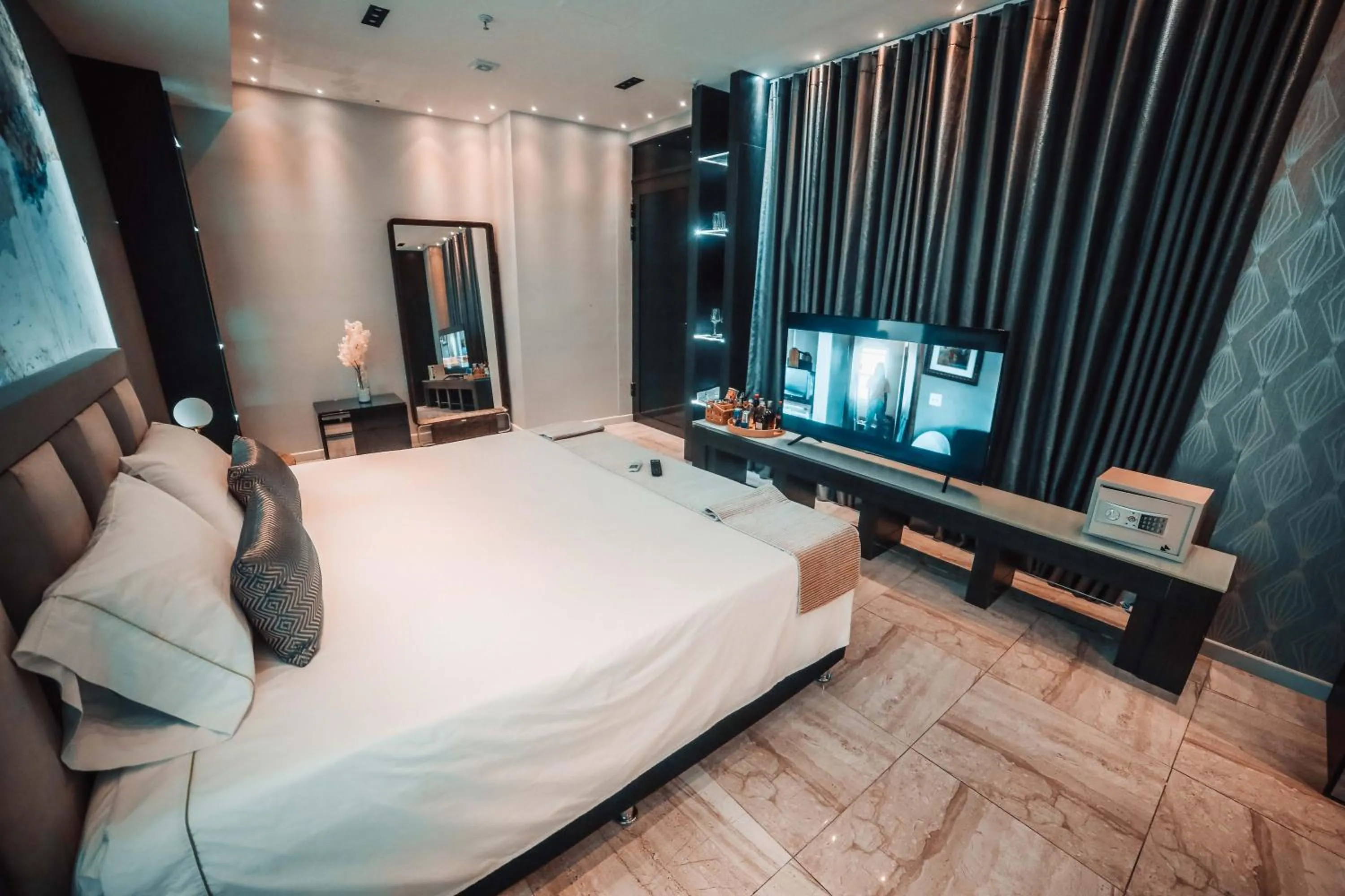 Bedroom in 1Million Luxury Suites