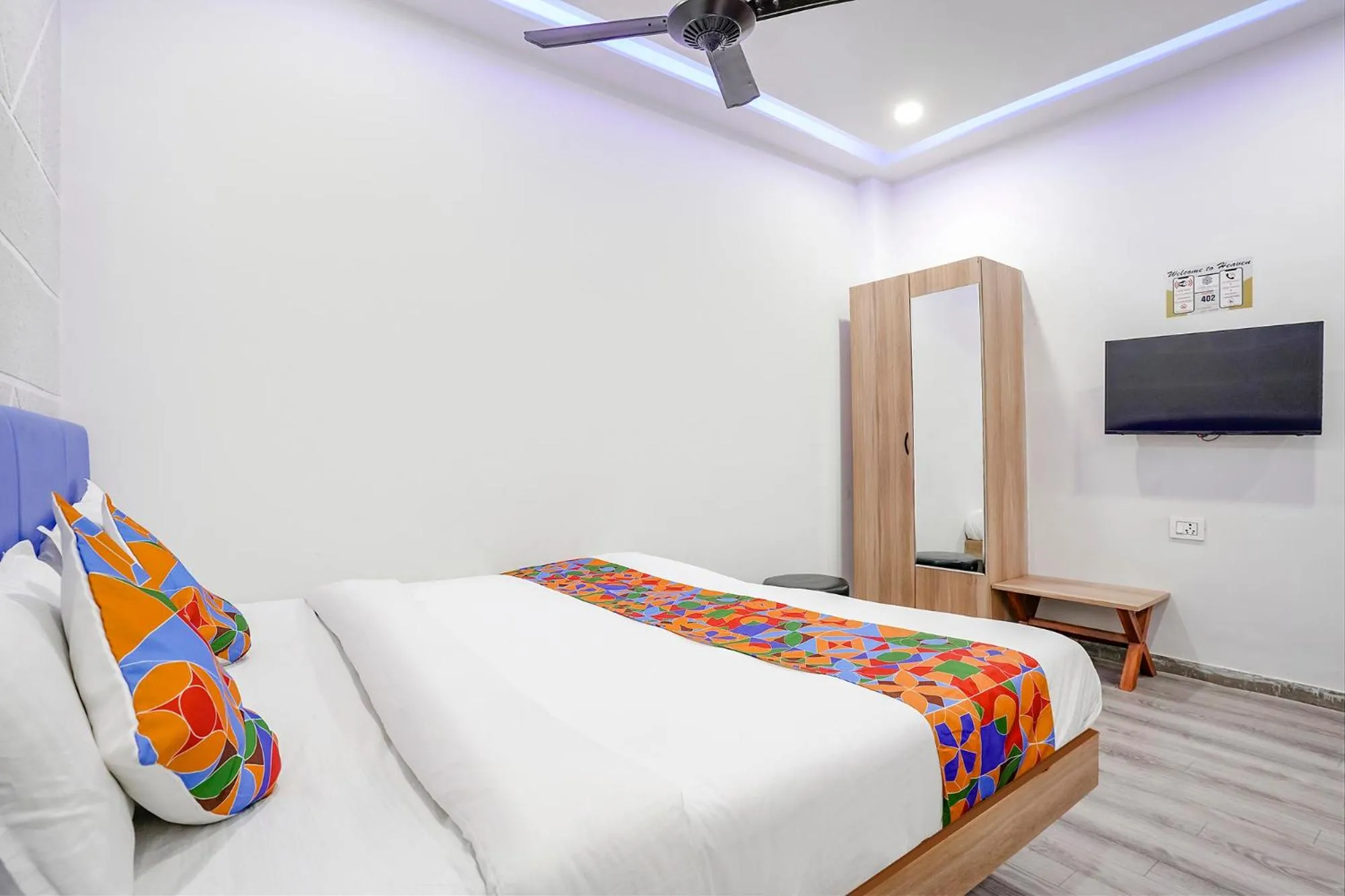 Communal lounge/ TV room, Bed in FabHotel Vrundavan, Athwa