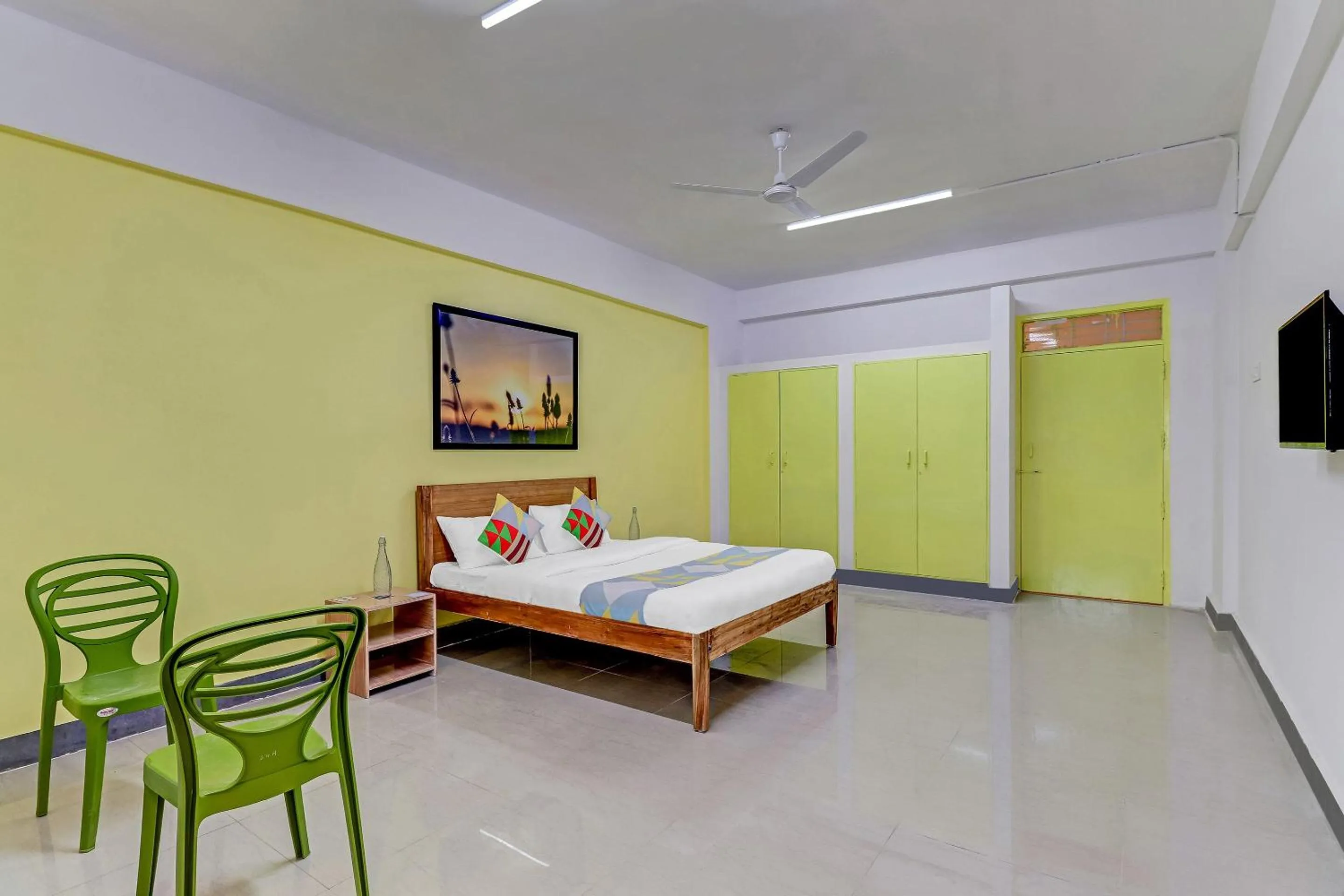 Bedroom, Bed in Capital O Elite Stay Jp Nagar Near SRI SATHYA GANAPATHI SHIRDI SAIBABA Temple