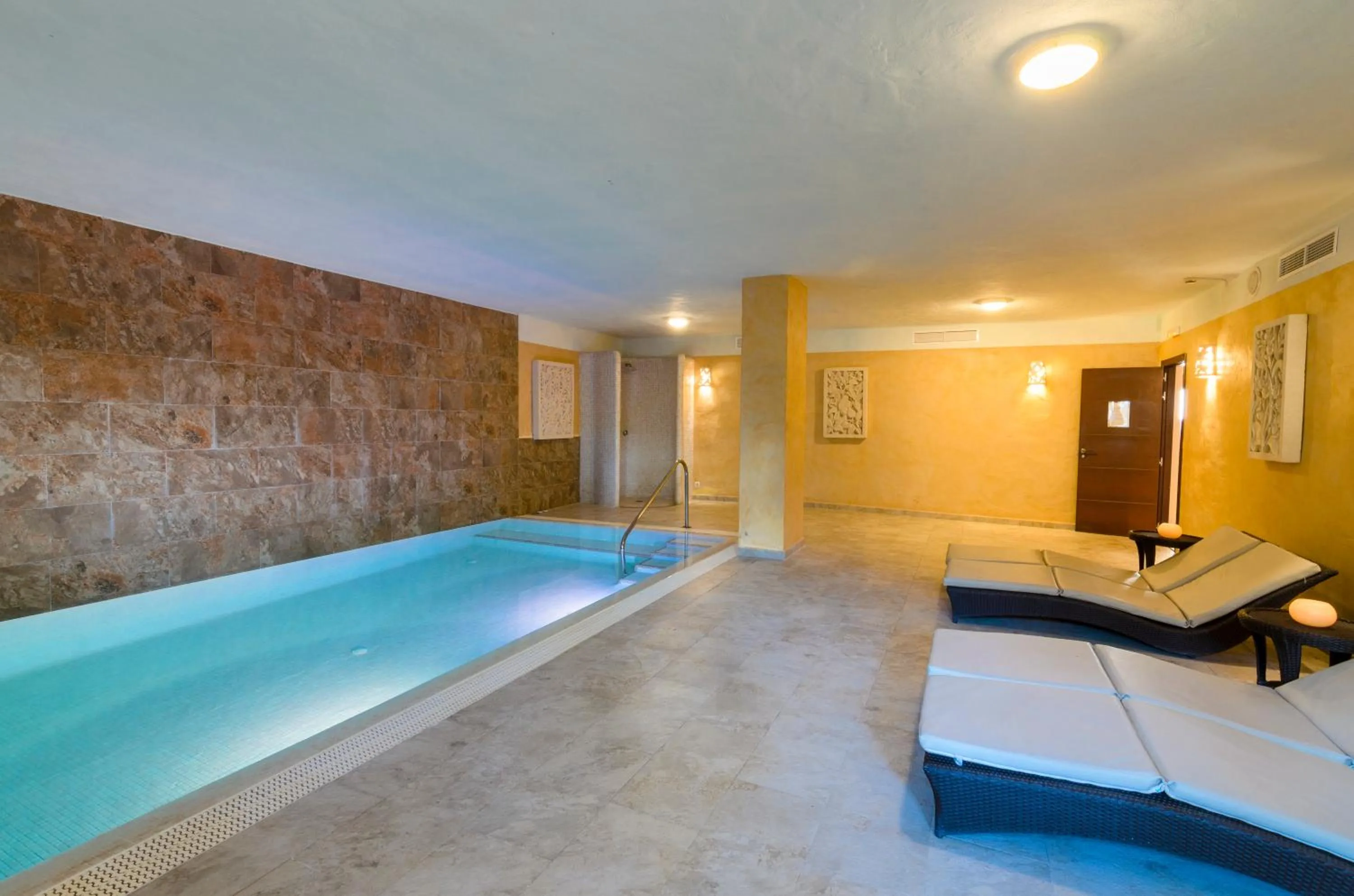 Hot Spring Bath in El Cortijo de Zahara by QHotels
