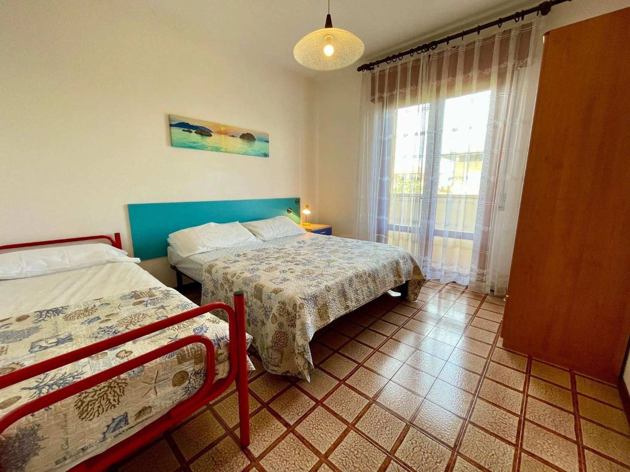 Bed in Vibrant apartment close to the beach - Beahost