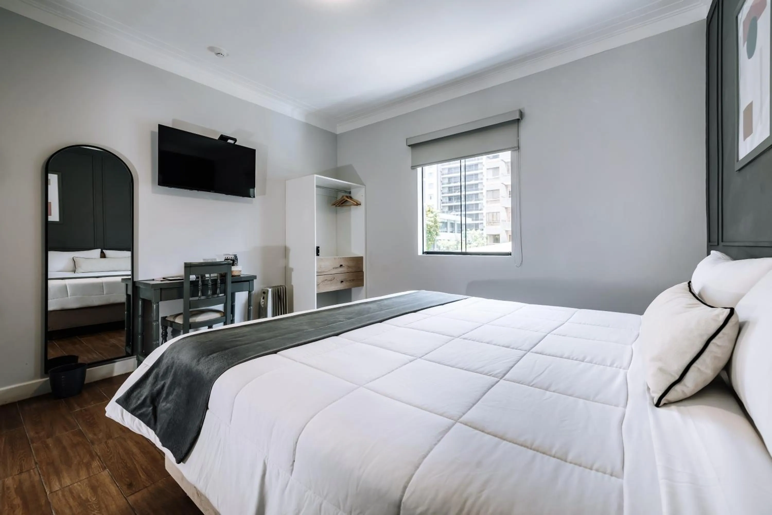 Bed in TARATA BOUTIQUE HOTEL