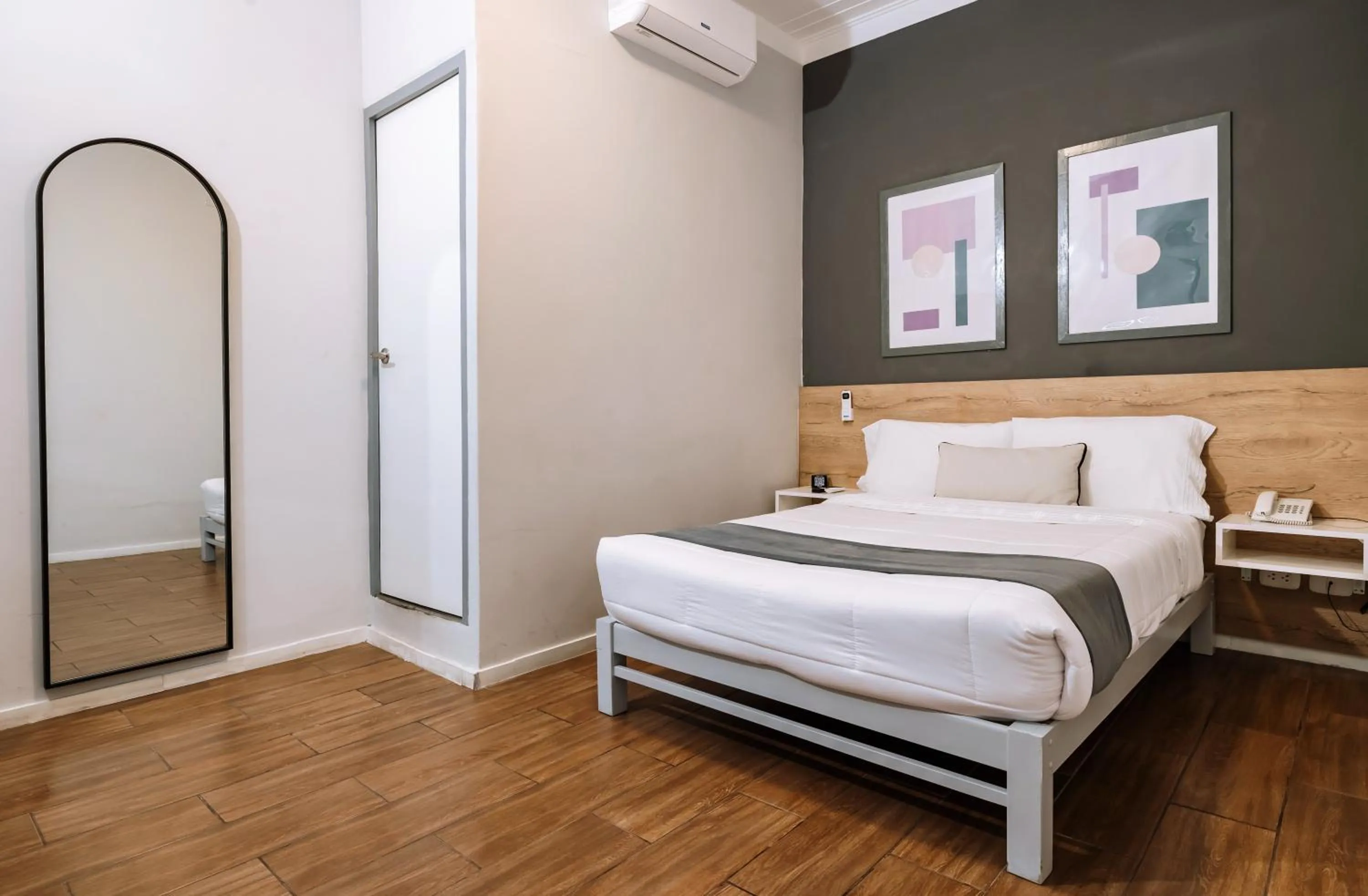 Bed in TARATA BOUTIQUE HOTEL