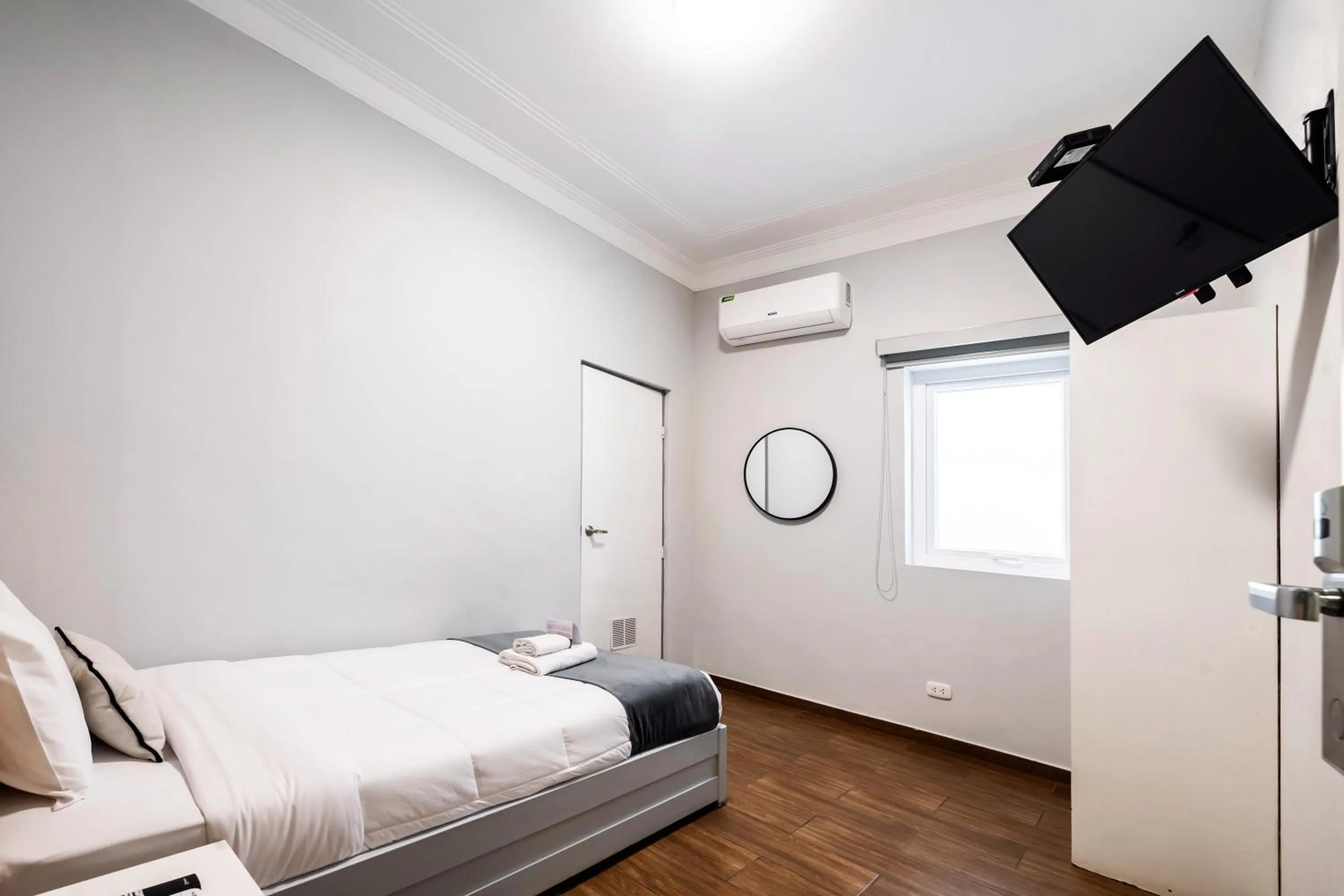 Bed in TARATA BOUTIQUE HOTEL