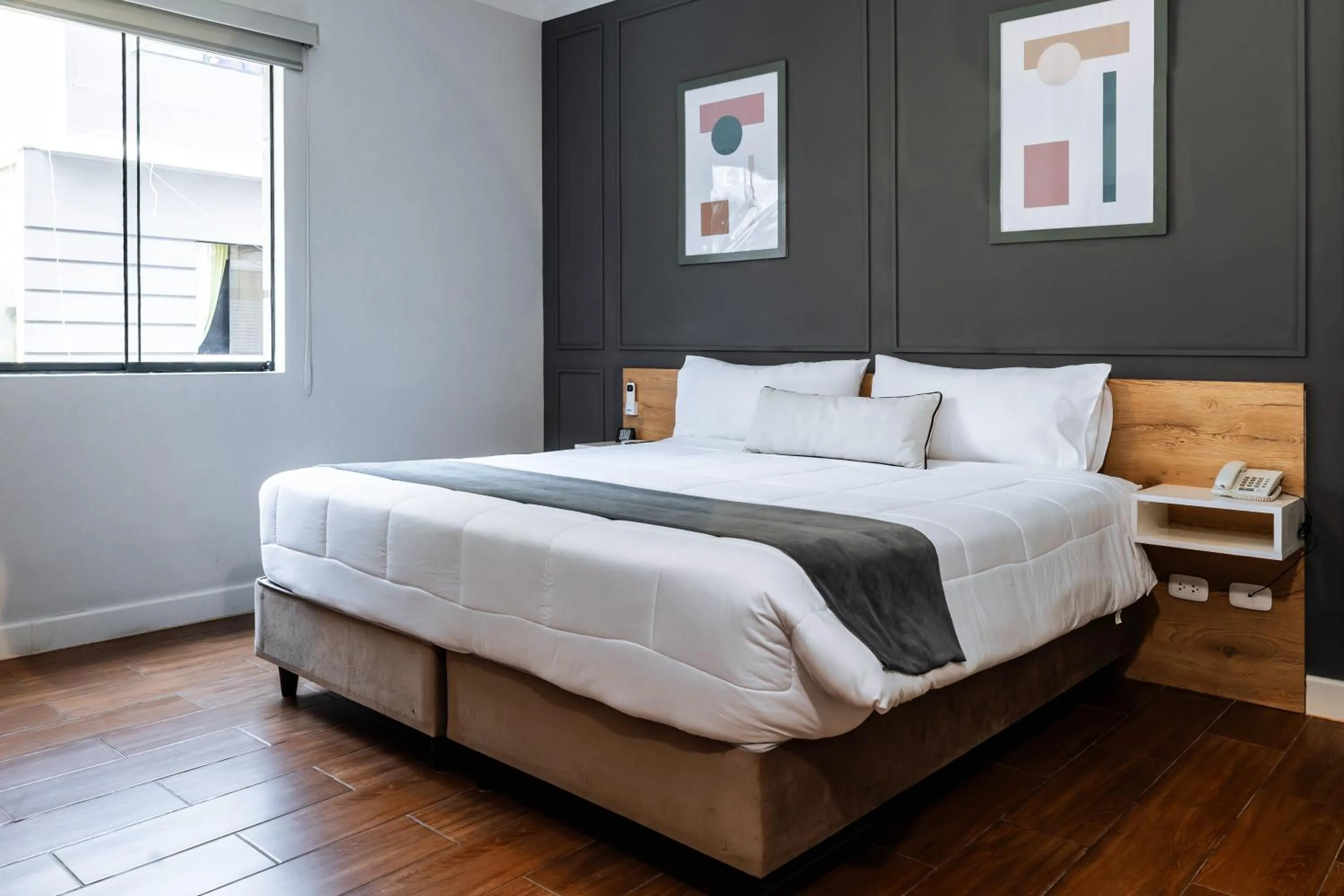 Bed in TARATA BOUTIQUE HOTEL