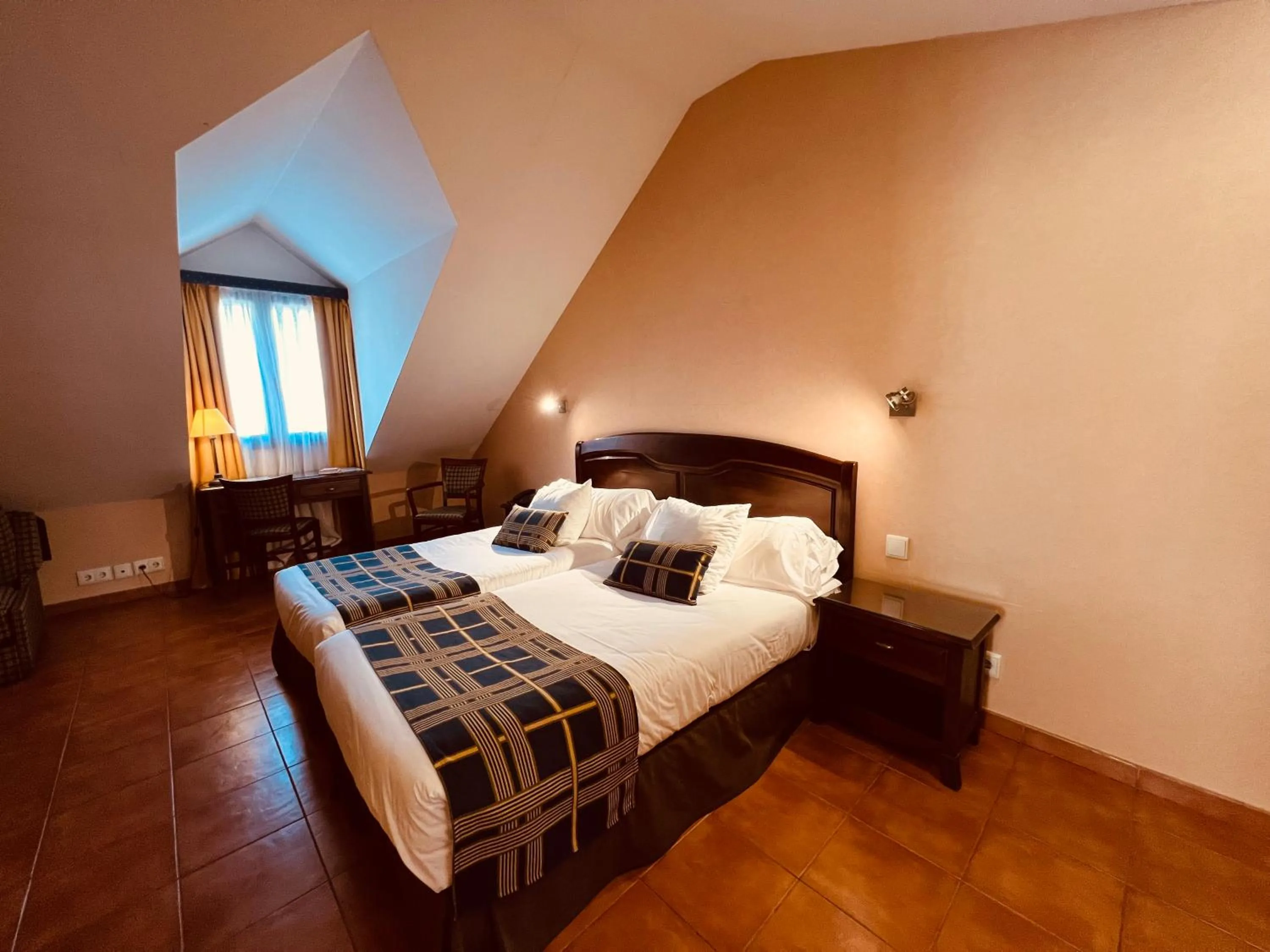 Bed in Hospedium Hotel Los Lanceros