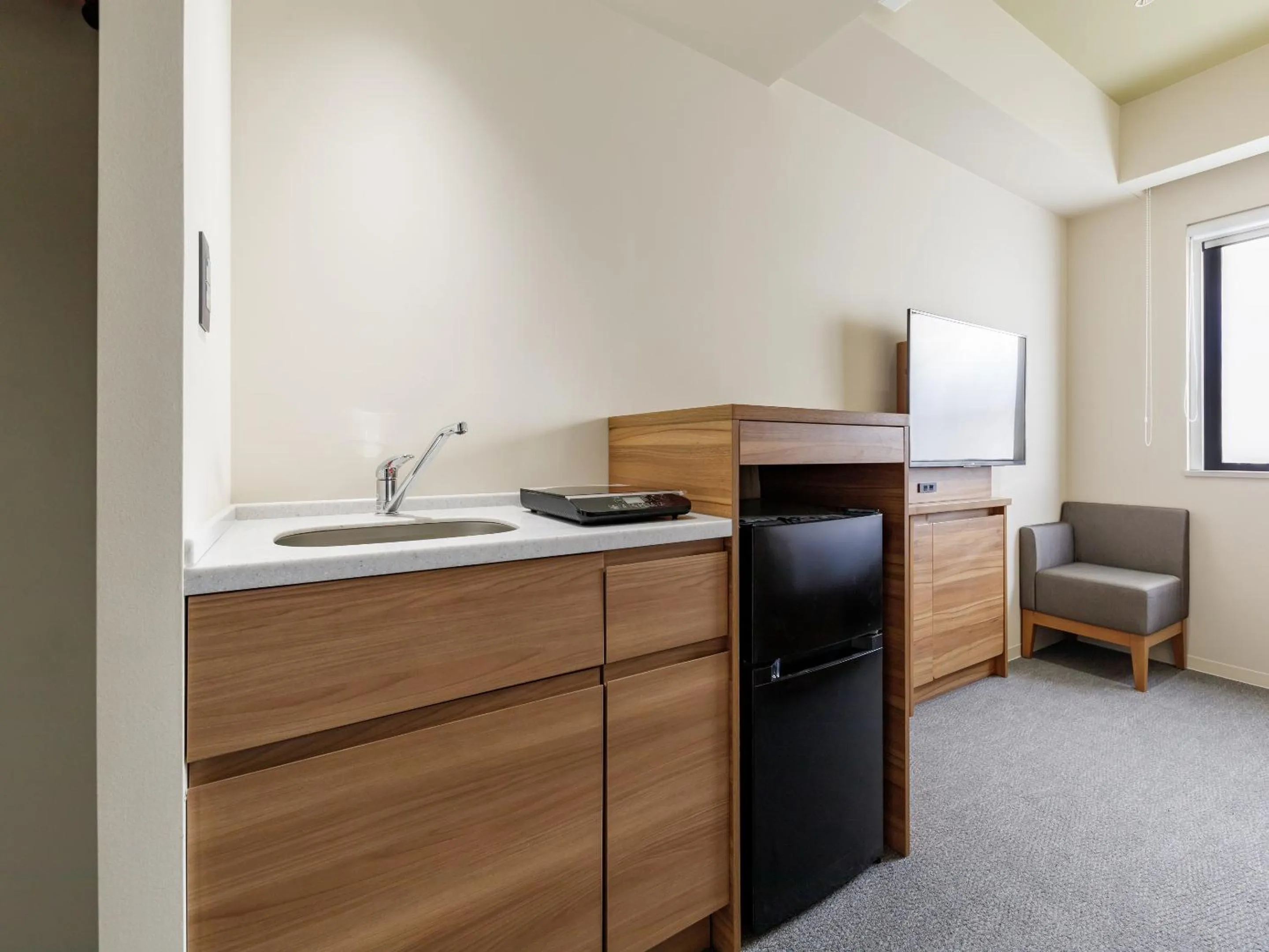 Kitchen or kitchenette in Nishitetsu Hotel Croom Hakata Gion Kushida Shrine