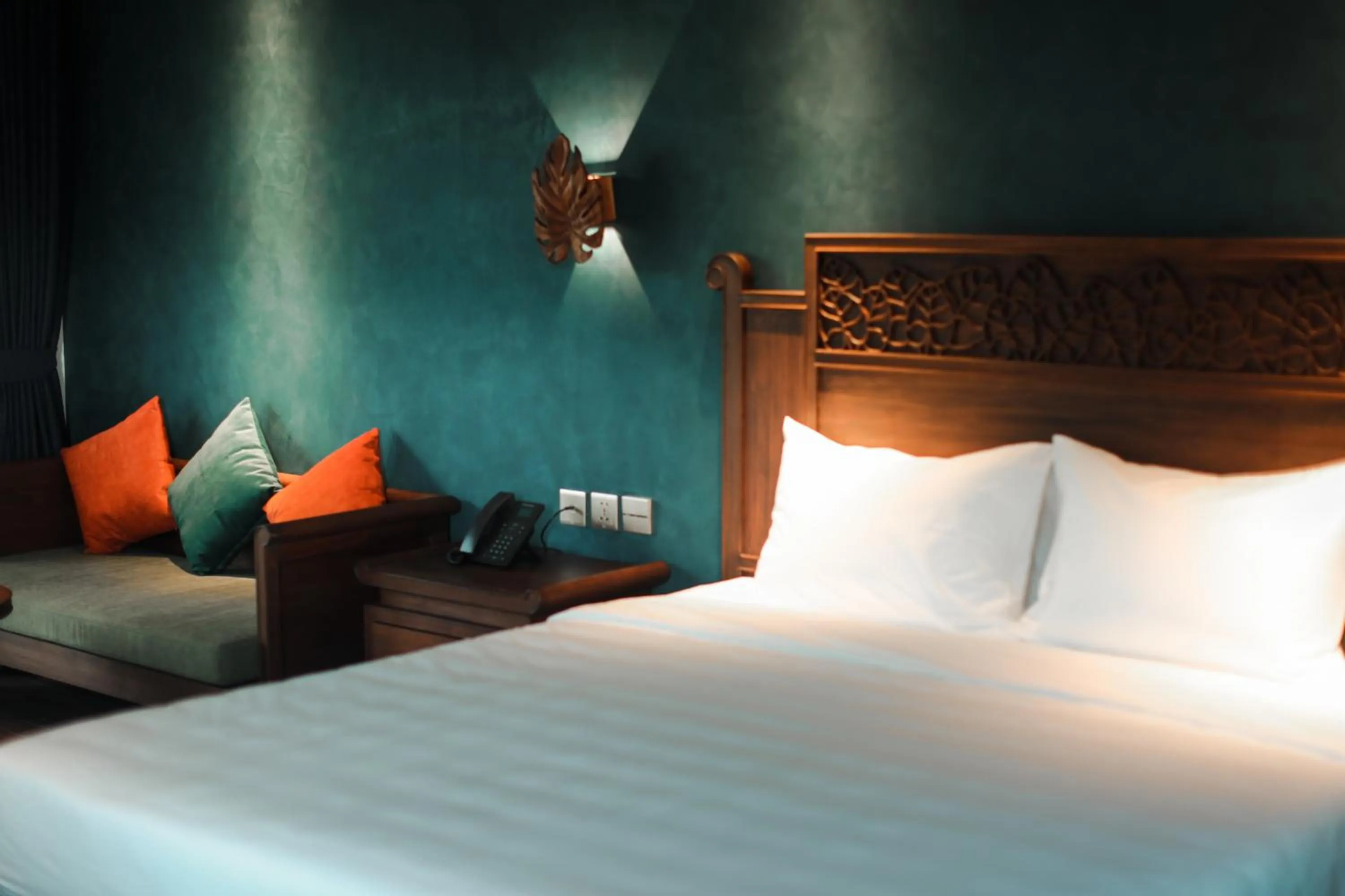 Bed in Amour Resort Bavi