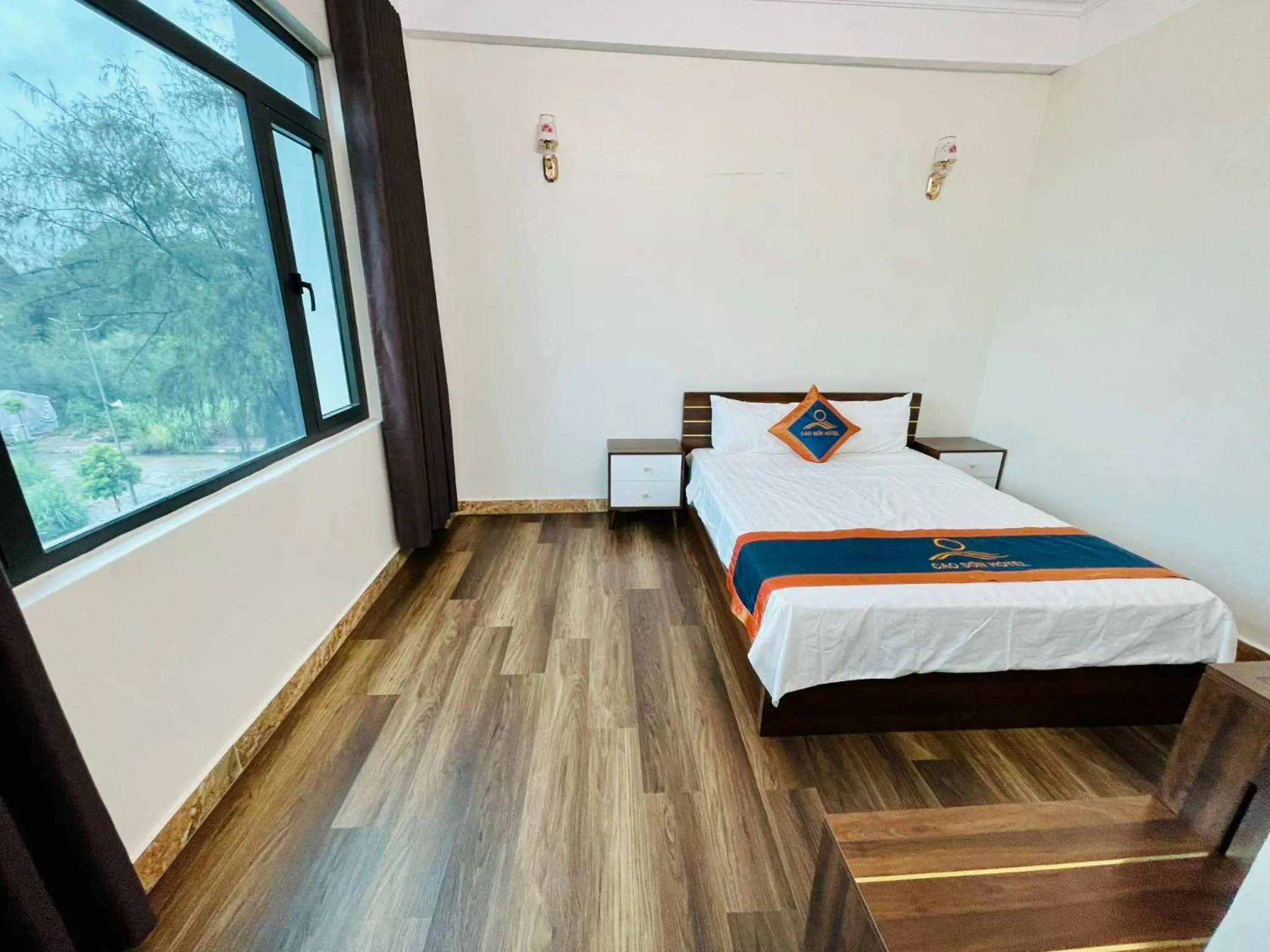 Bed in Khách Sạn Cao Sơn Cẩm Phả