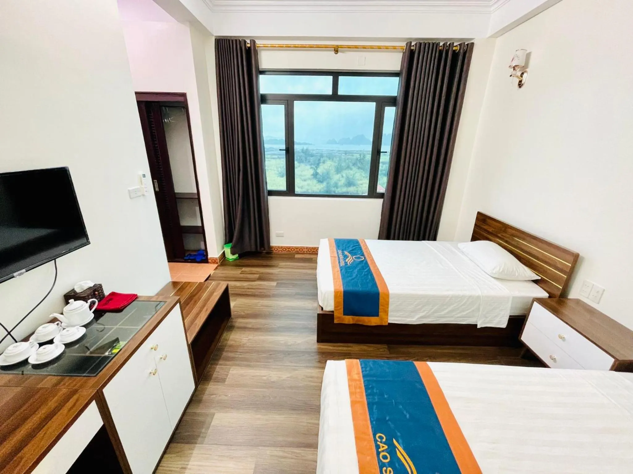 Bed in Khách Sạn Cao Sơn Cẩm Phả