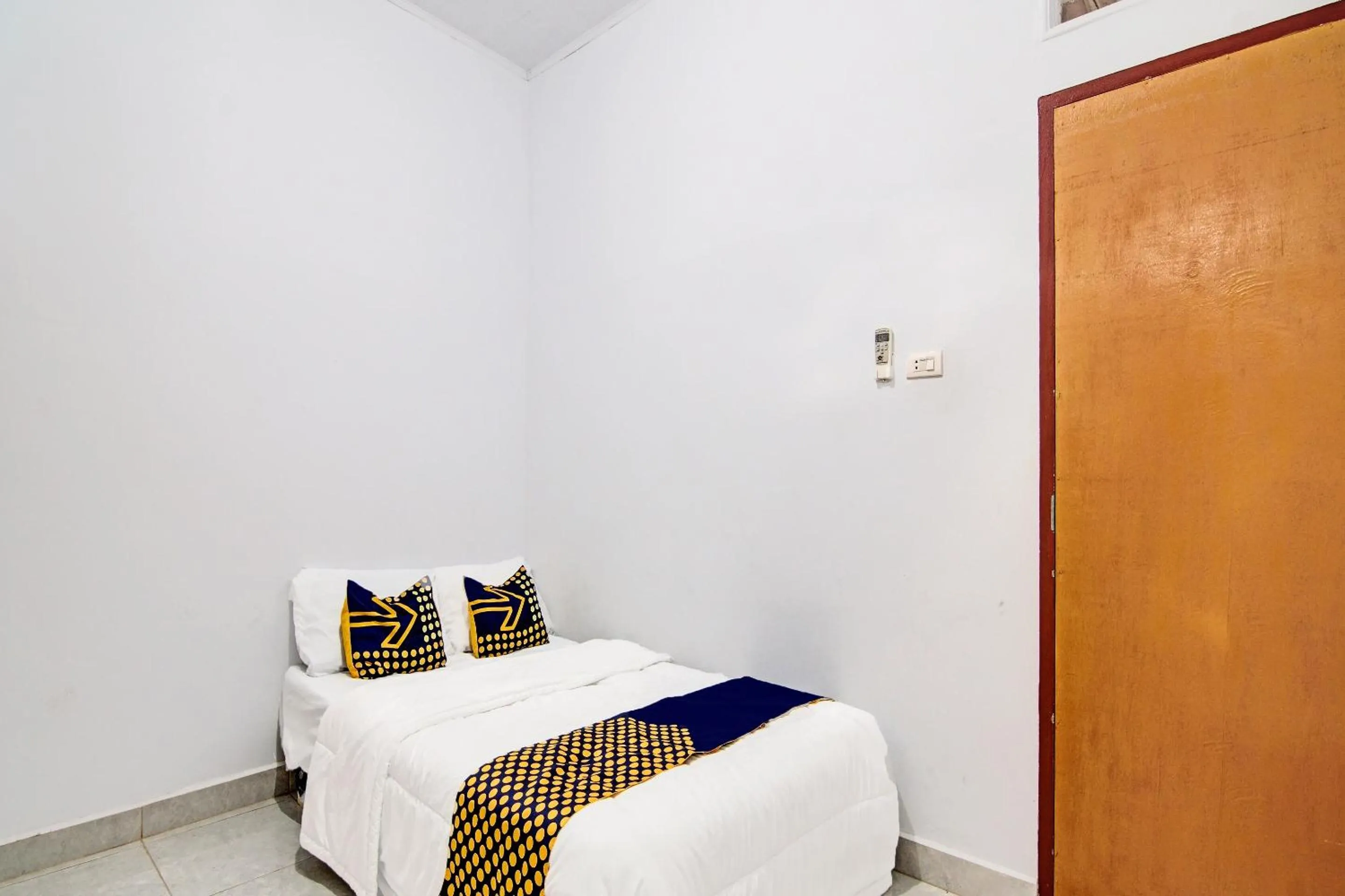 Bedroom in SPOT ON 91950 Guest House TekNong Syariah