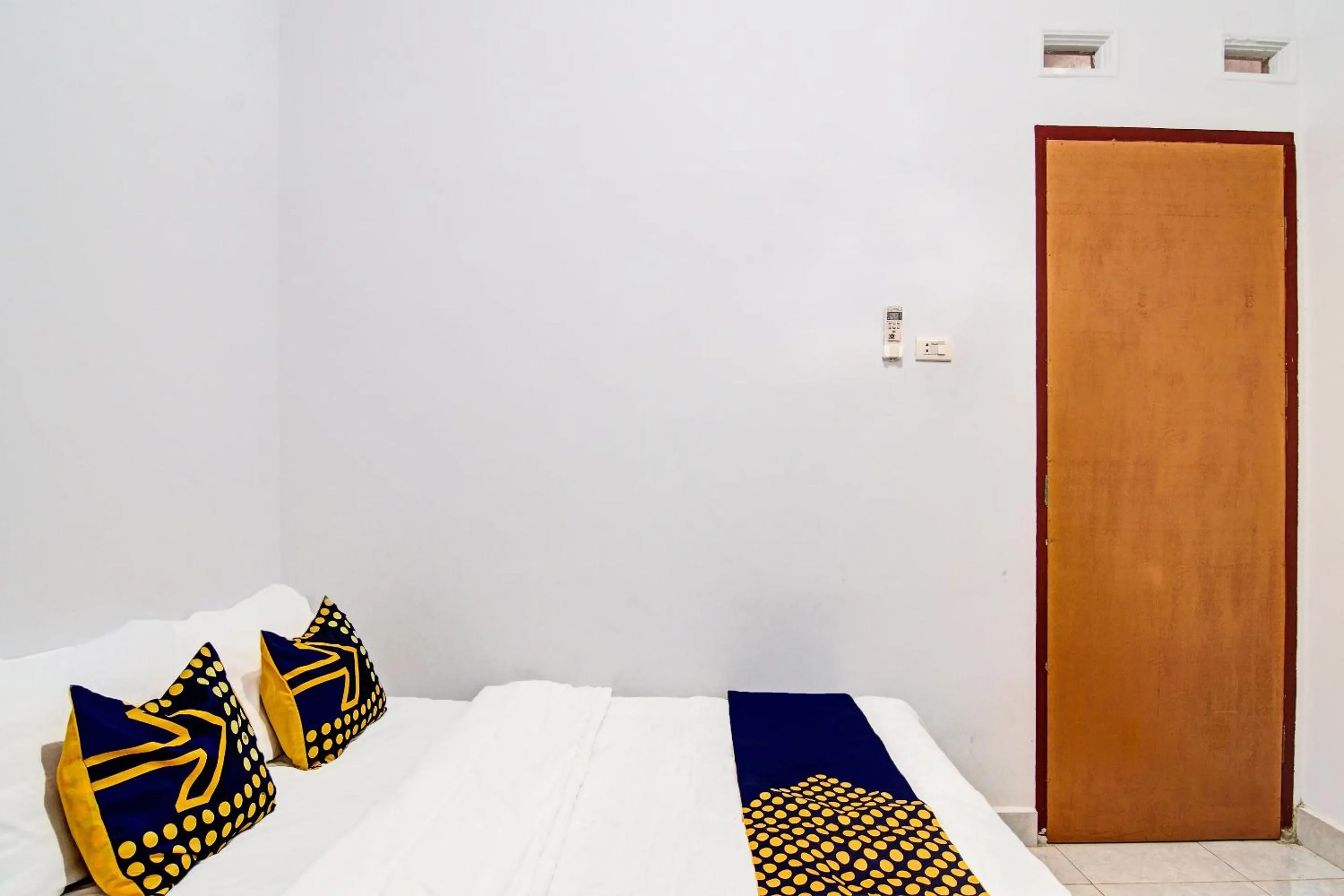 Bedroom in SPOT ON 91950 Guest House TekNong Syariah