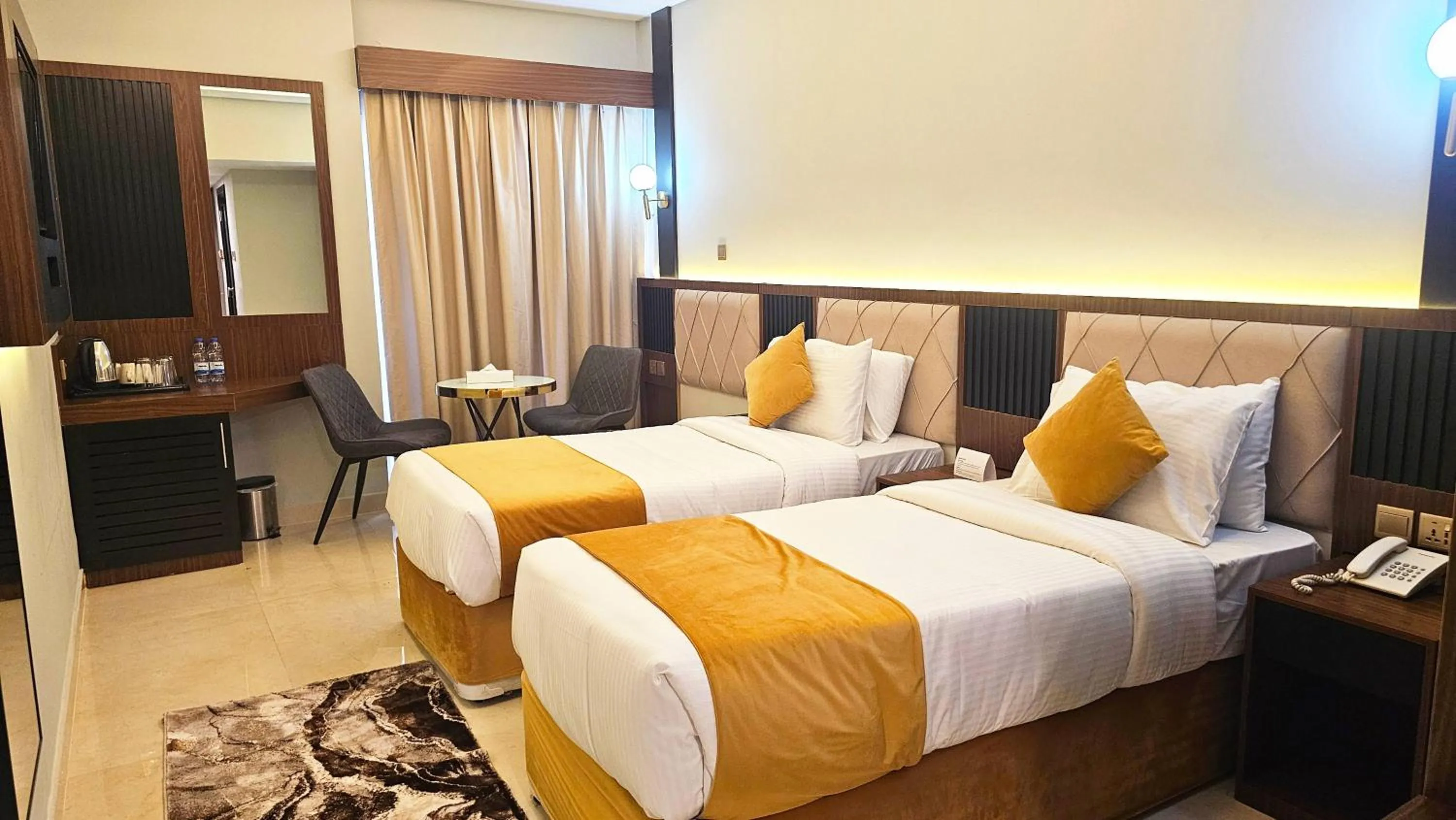 Bed in Concorde Inn Hotel