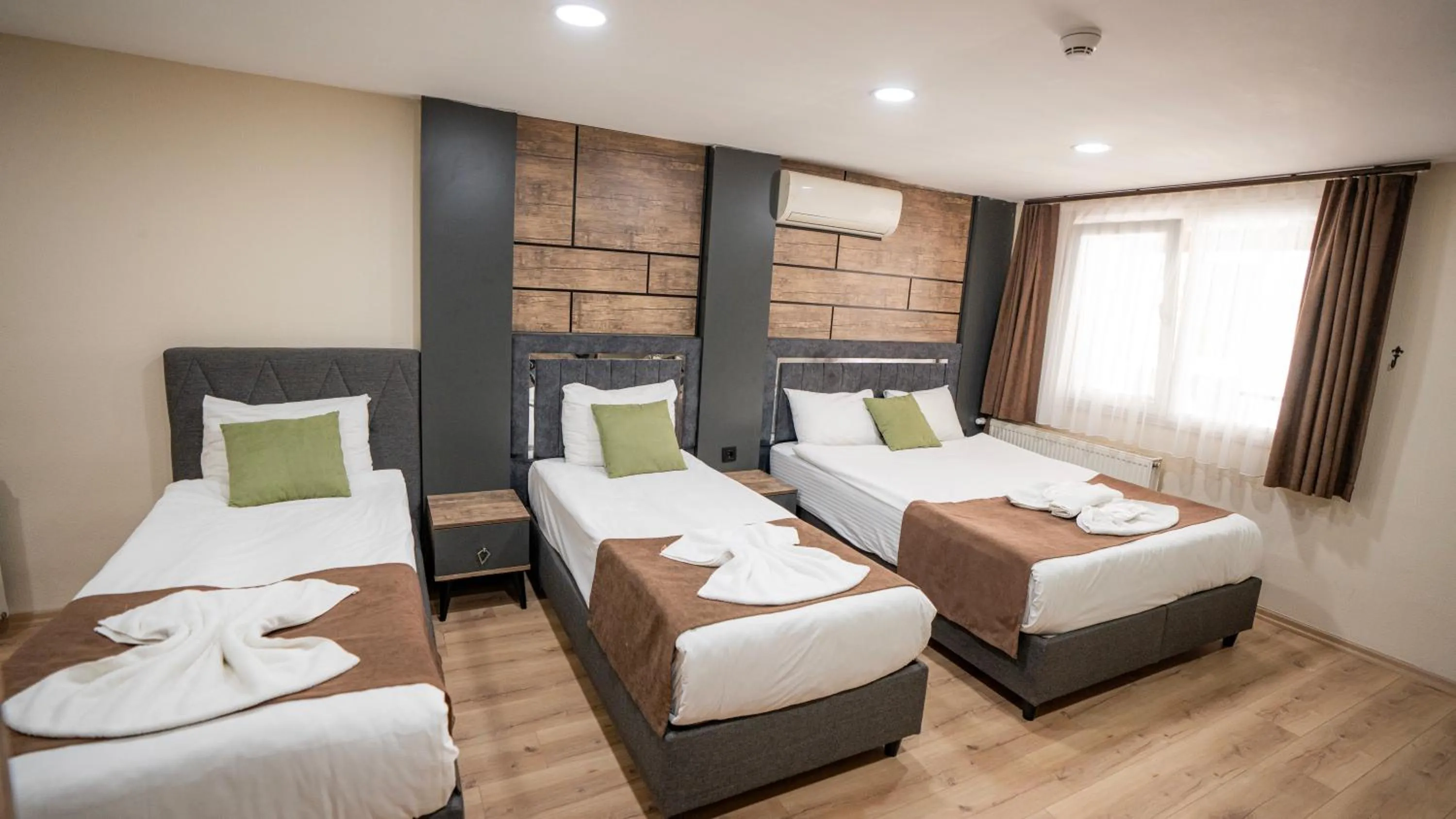 Bed in MİLA SUİTES TAKSİM