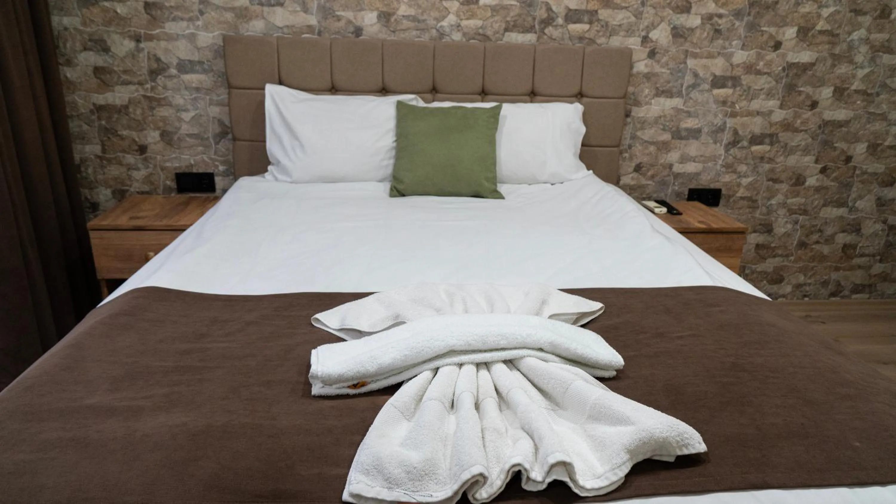 Bed in MİLA SUİTES TAKSİM