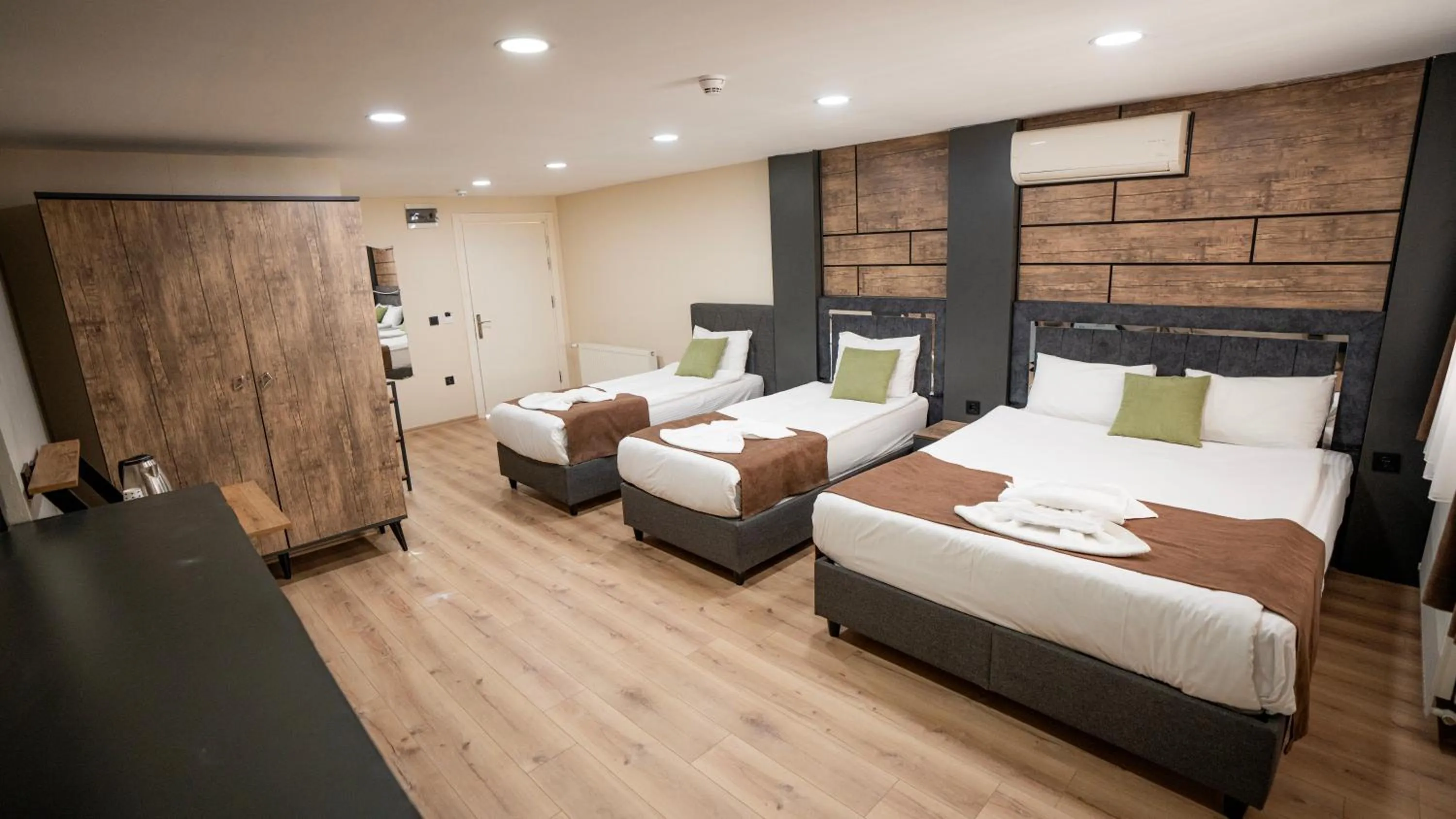 Bed in MİLA SUİTES TAKSİM