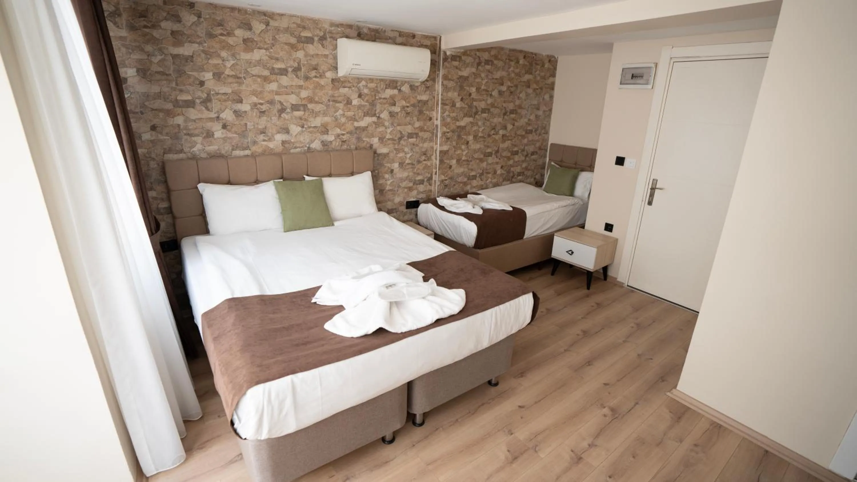 Bed in MİLA SUİTES TAKSİM