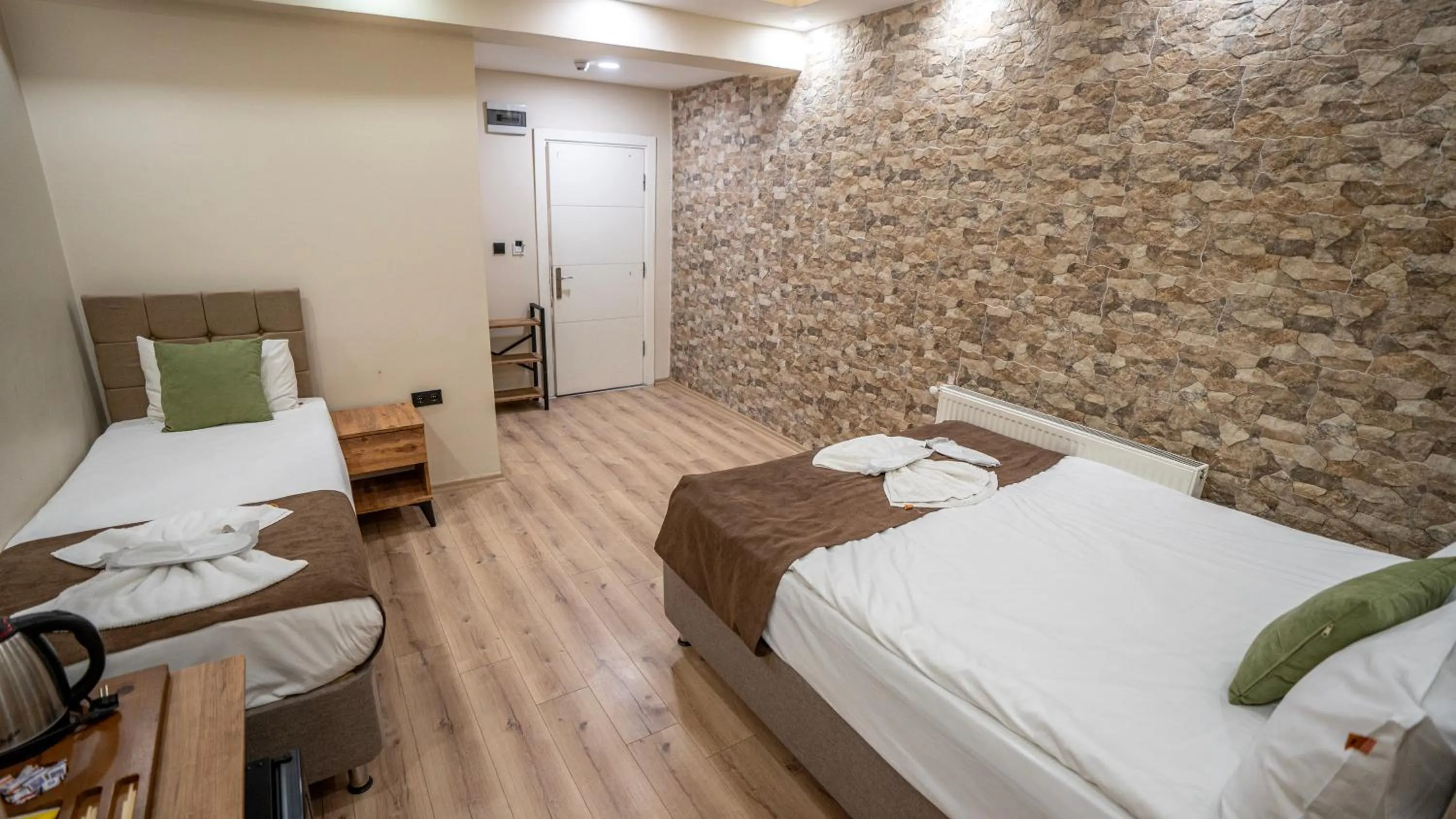 Bed in MİLA SUİTES TAKSİM