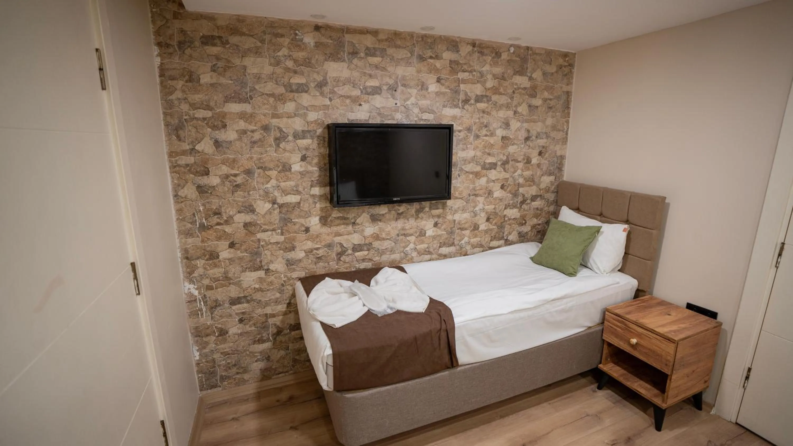 Bed in MİLA SUİTES TAKSİM