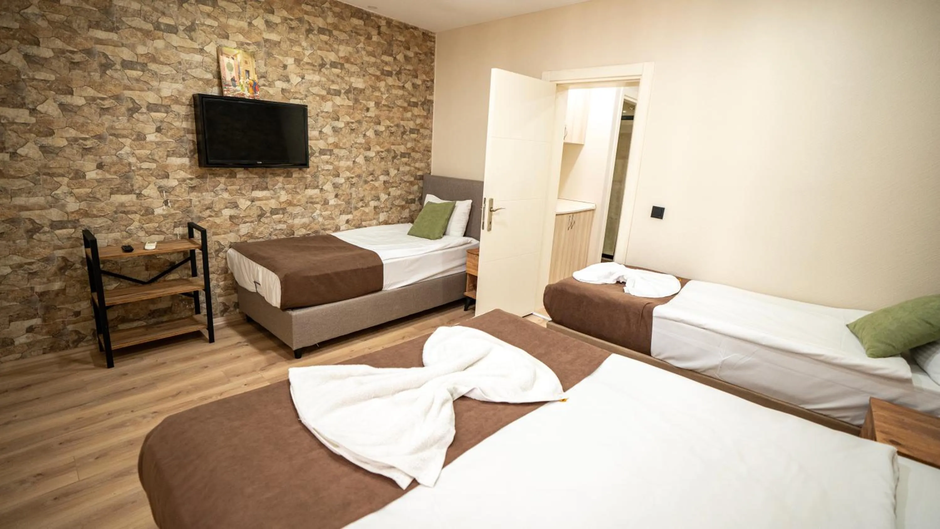 Bed in MİLA SUİTES TAKSİM