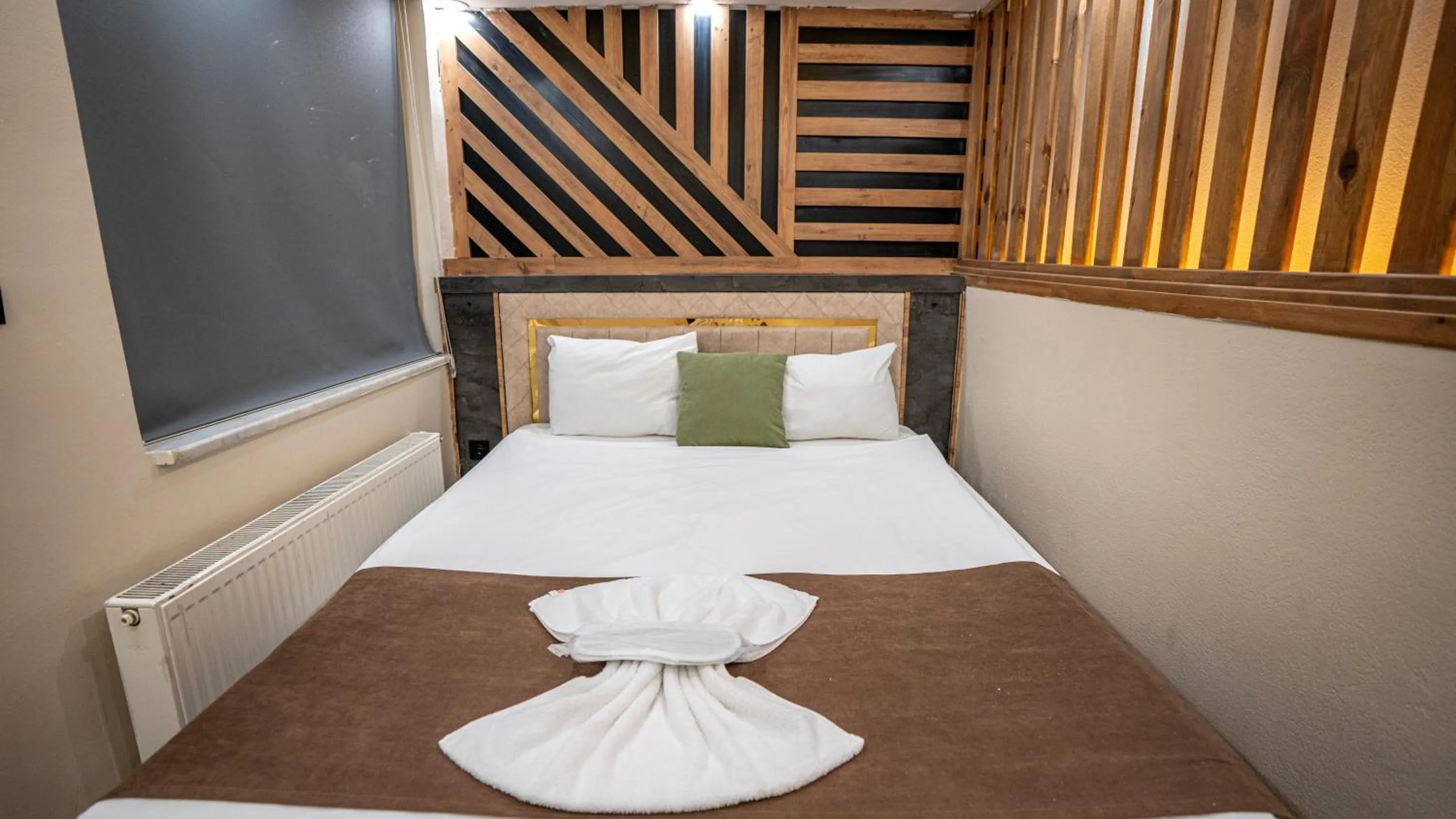 Bed in MİLA SUİTES TAKSİM