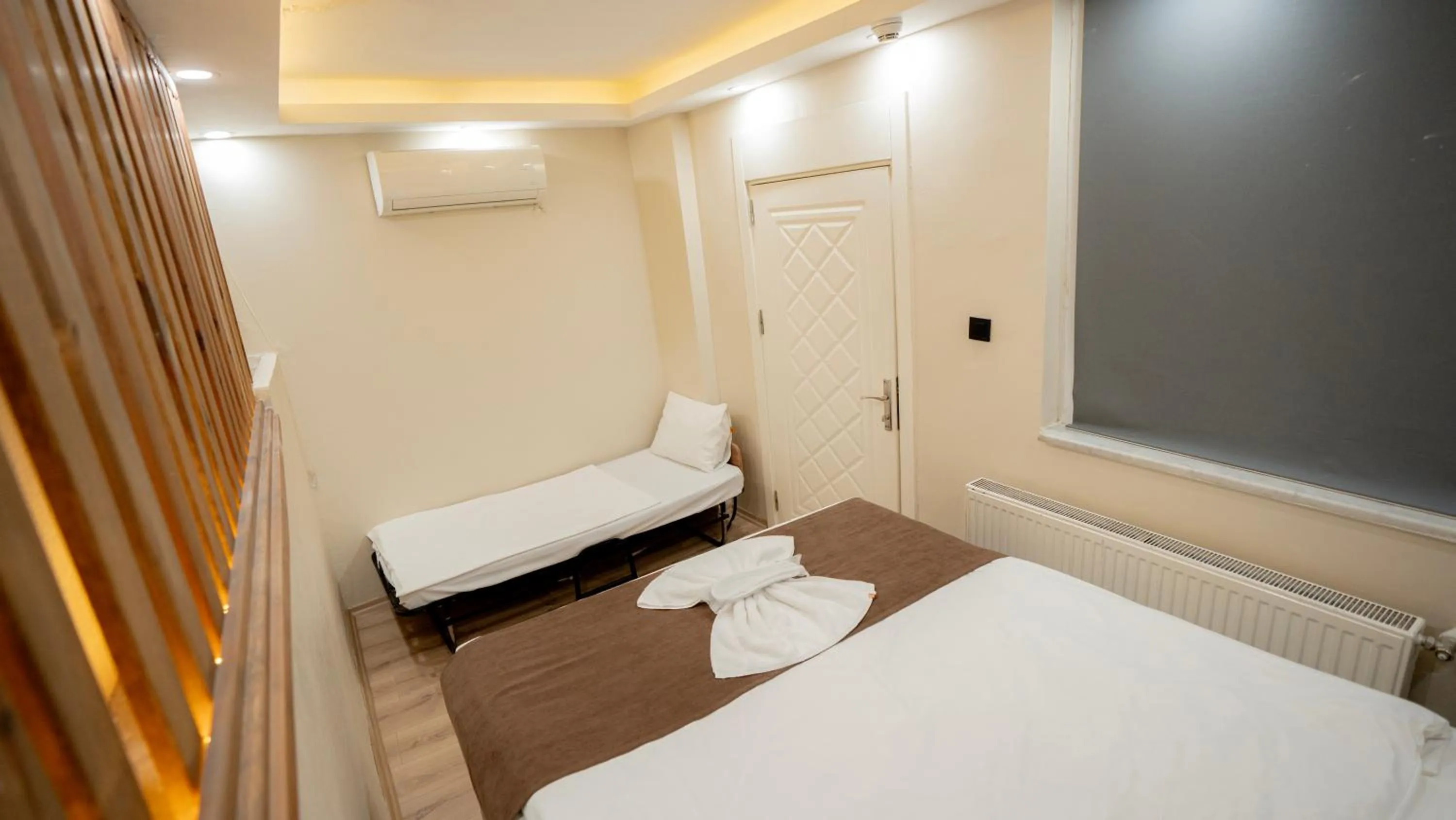 Bed in MİLA SUİTES TAKSİM