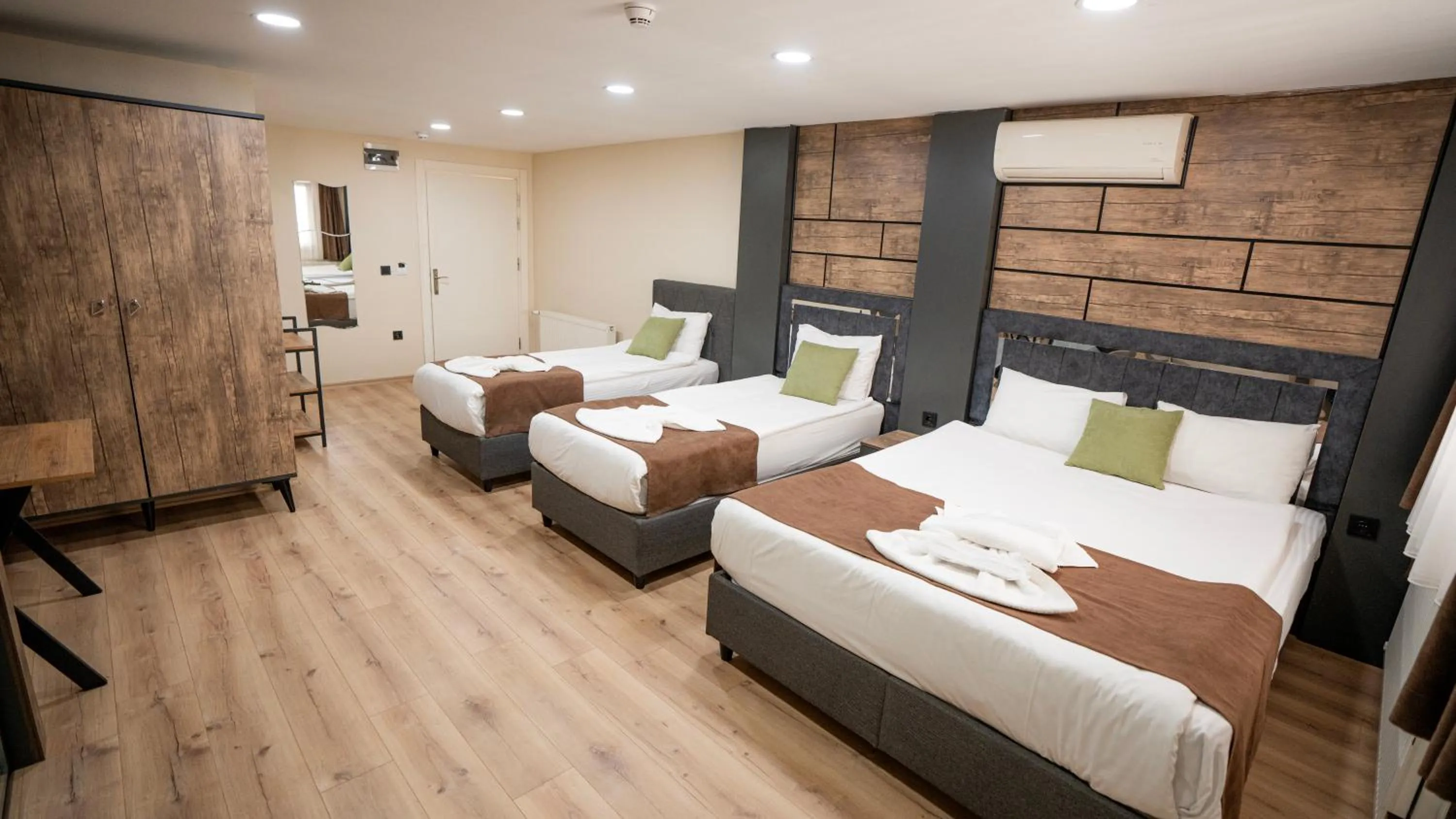 Bed in MİLA SUİTES TAKSİM