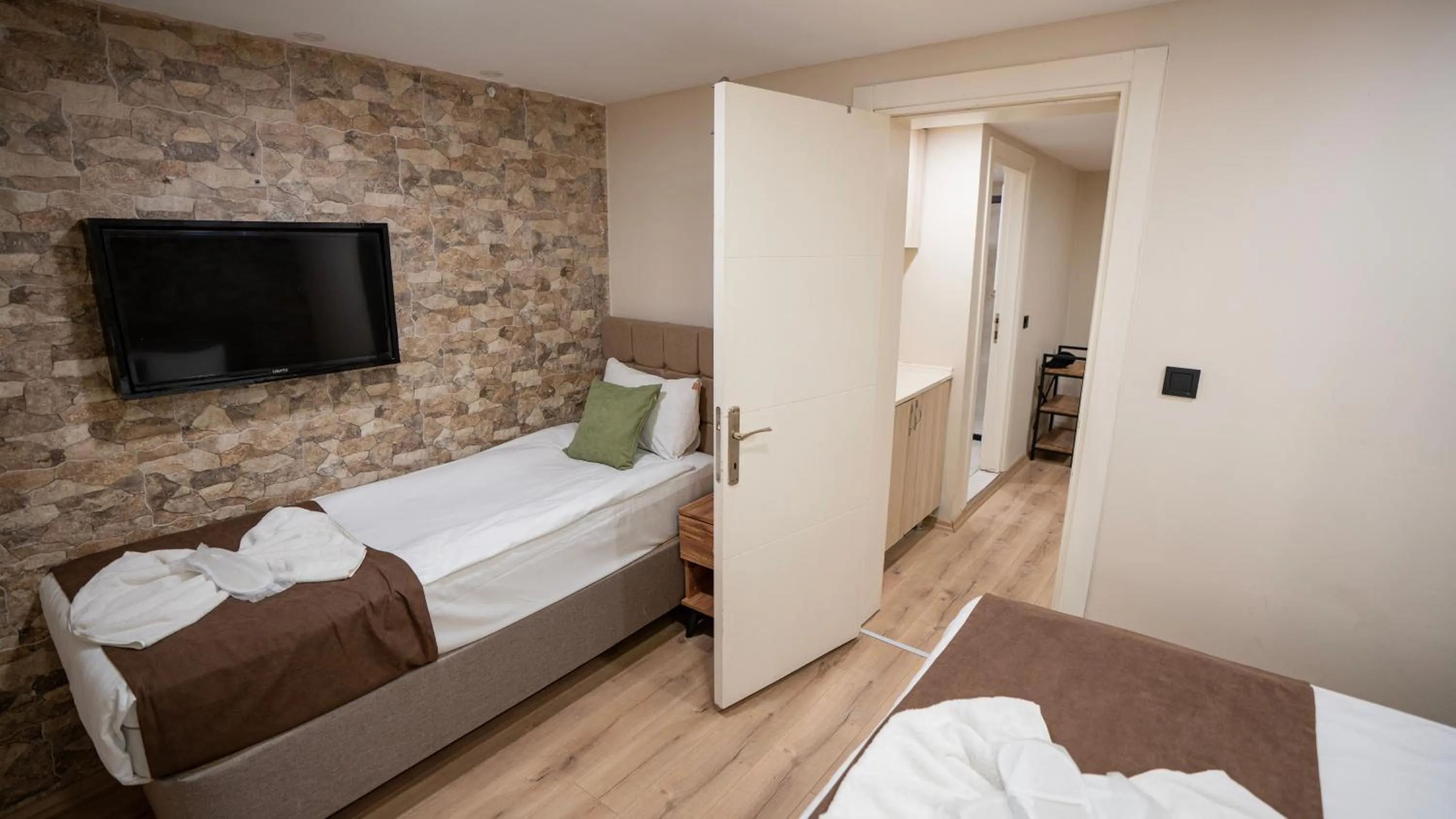 Bed in MİLA SUİTES TAKSİM