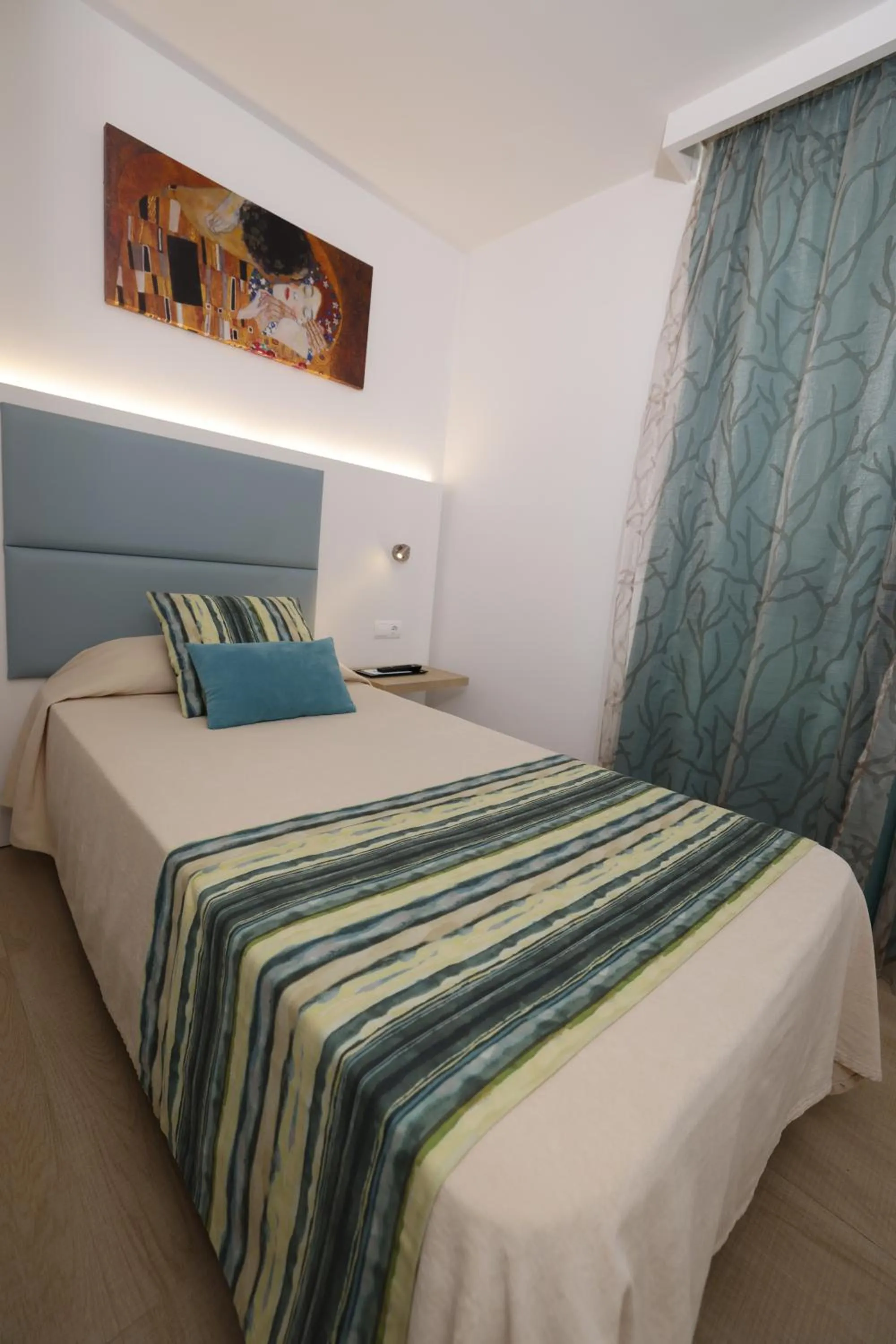 Bed in Marvell Club Hotel & Apartments
