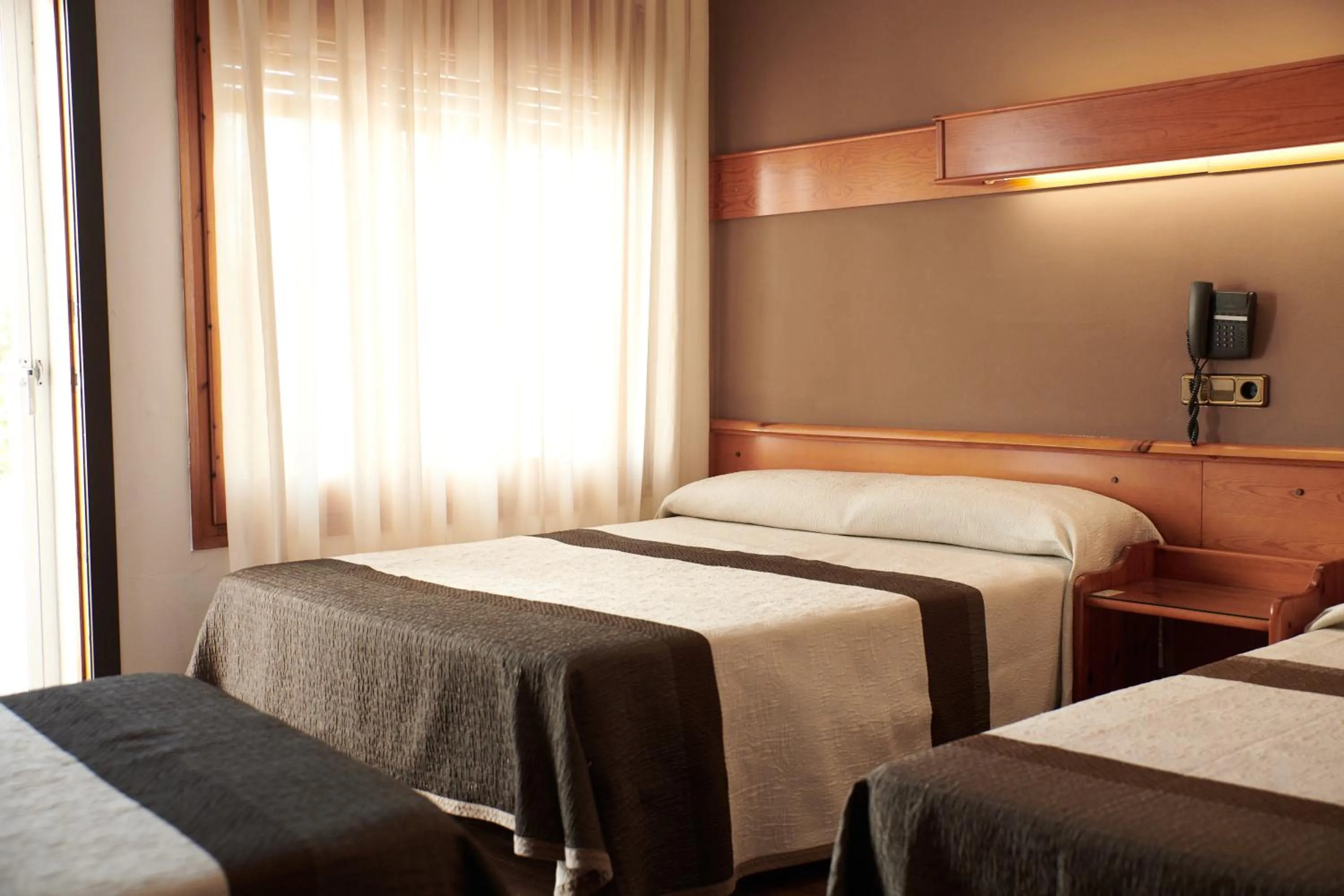 Quadruple Room in Checkin Flamingo