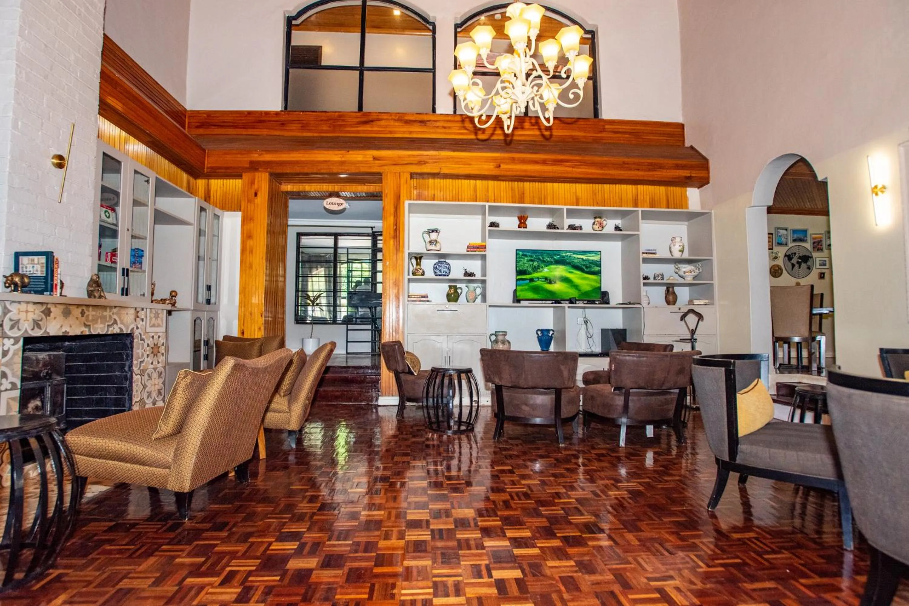 Communal lounge/ TV room in Cozy Stead Hotel - Garden House, Gigiri