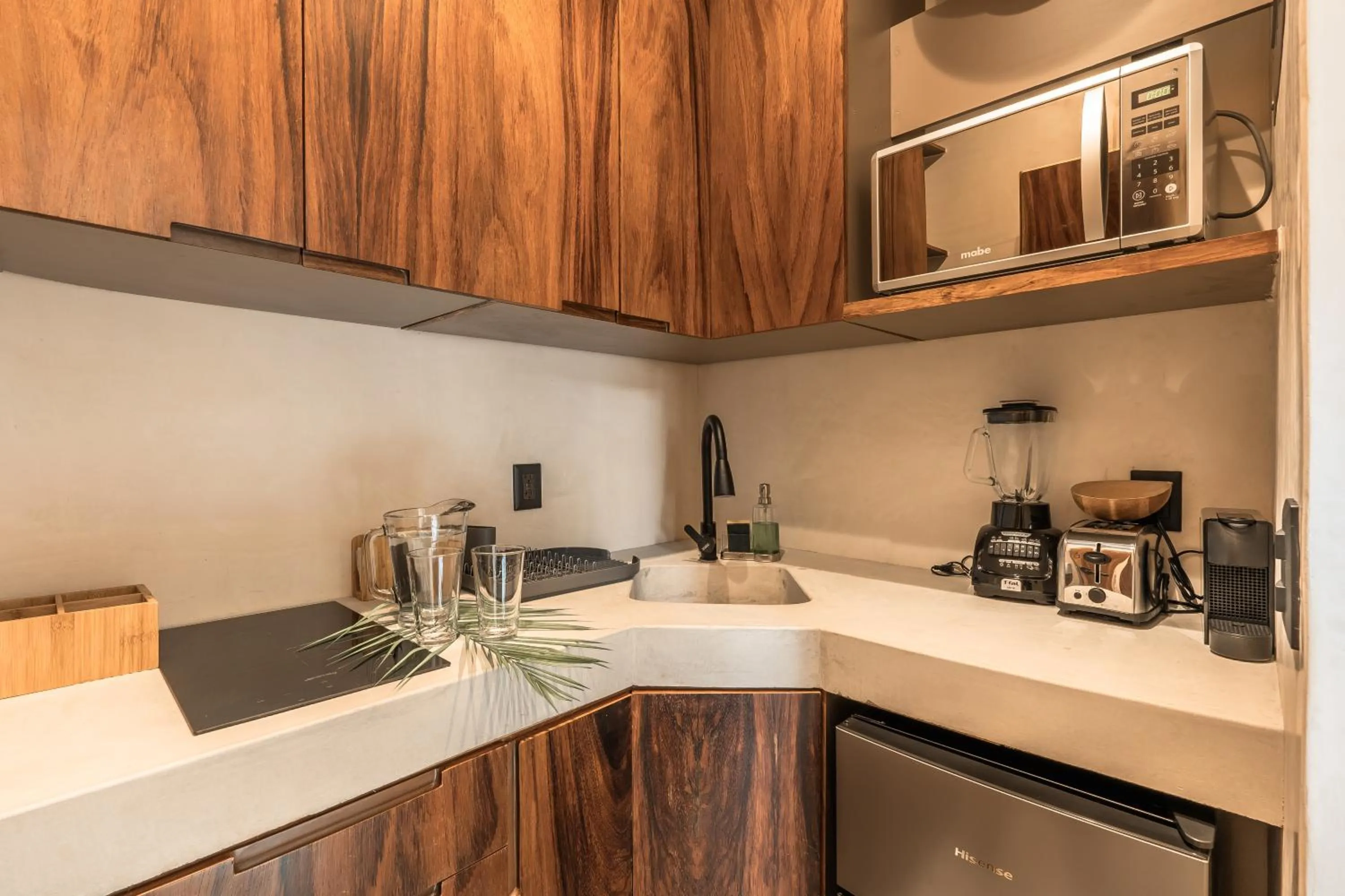 Kitchen or kitchenette in NAJ Boutique Hotel - Aldea Zama