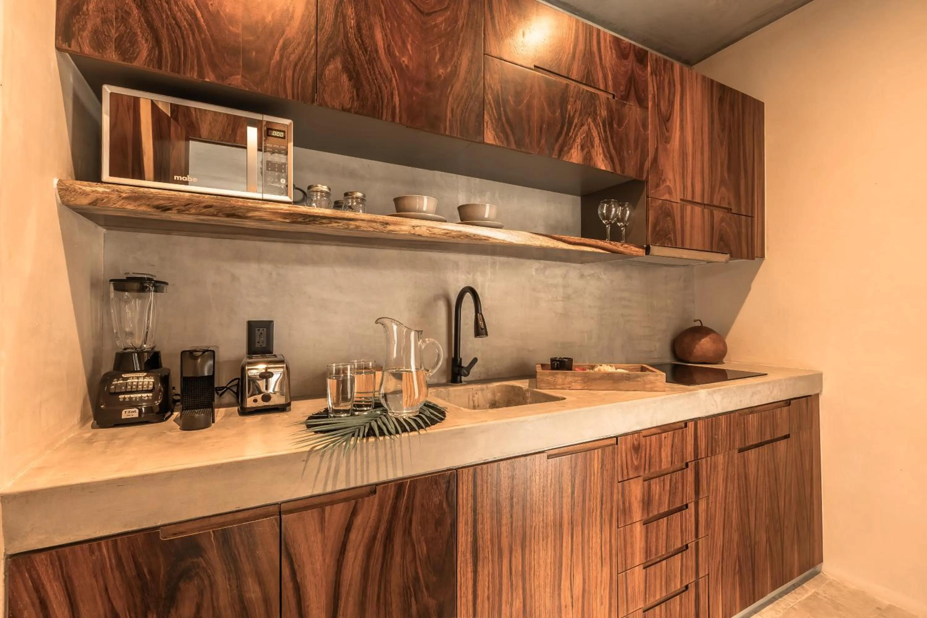 Kitchen or kitchenette in NAJ Boutique Hotel - Aldea Zama