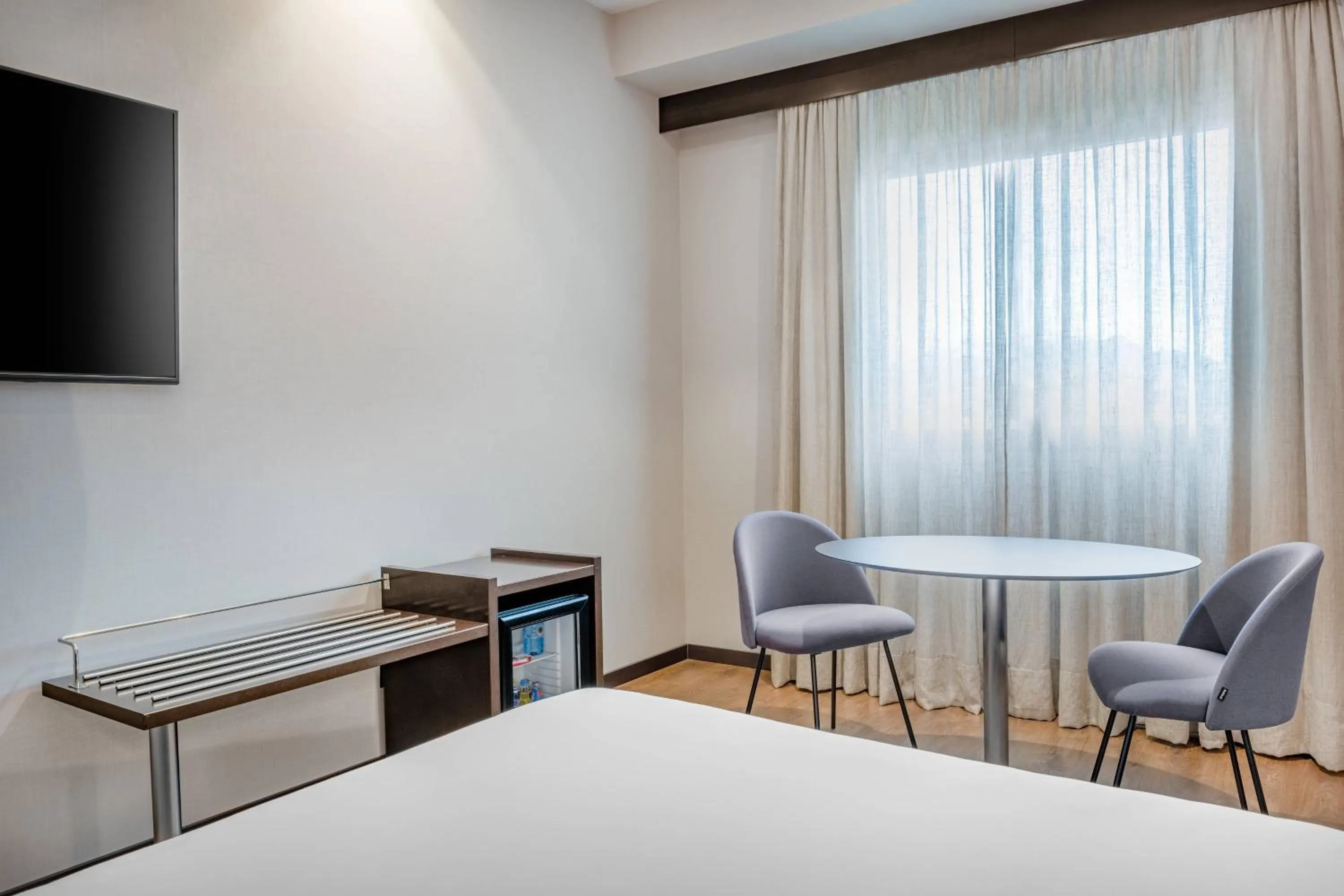 Photo of the whole room, Bed in AC Hotel Oviedo Fórum by Marriott