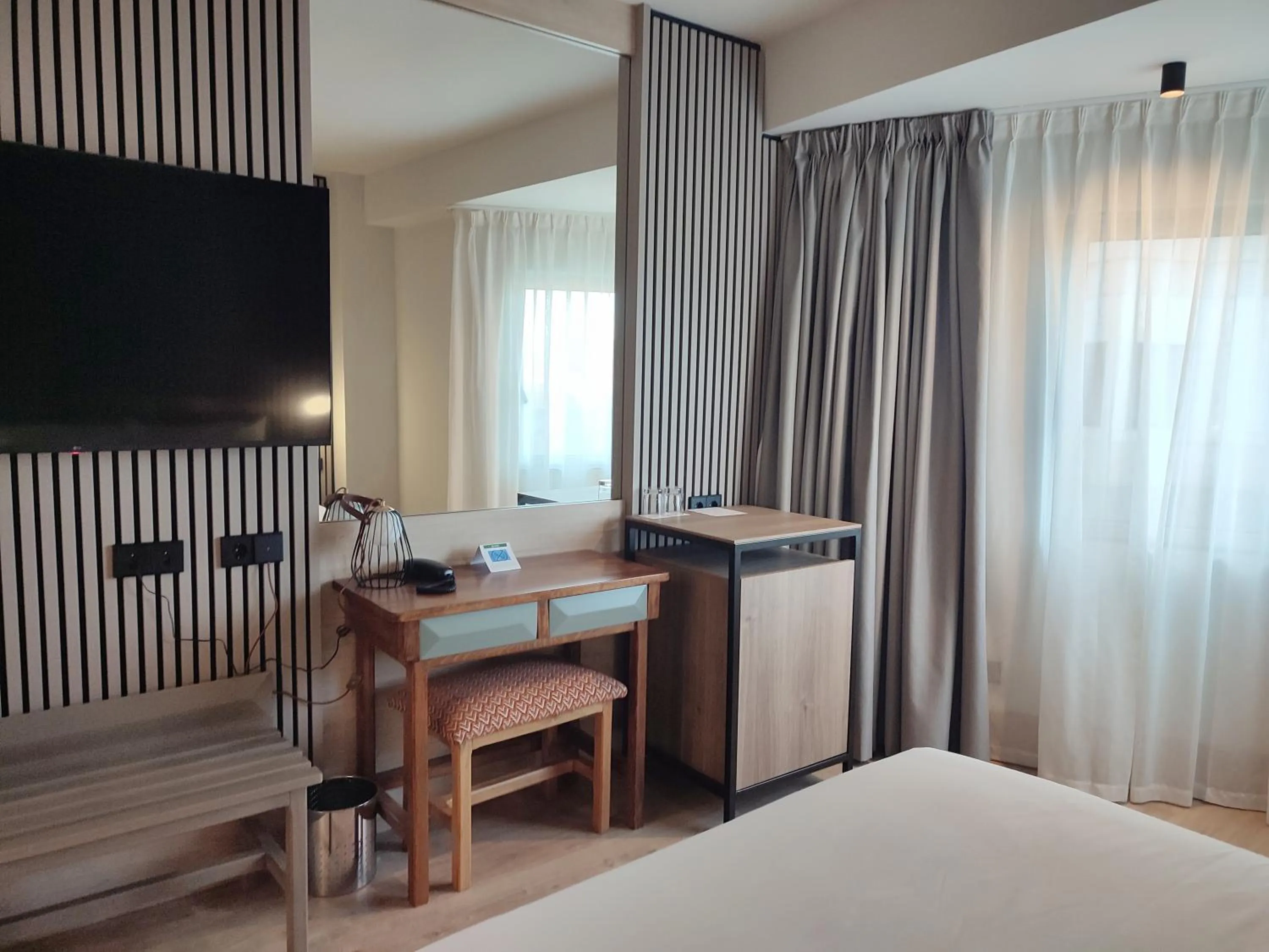 Seating area, Bed in Hotel Sercotel Cuatro Postes