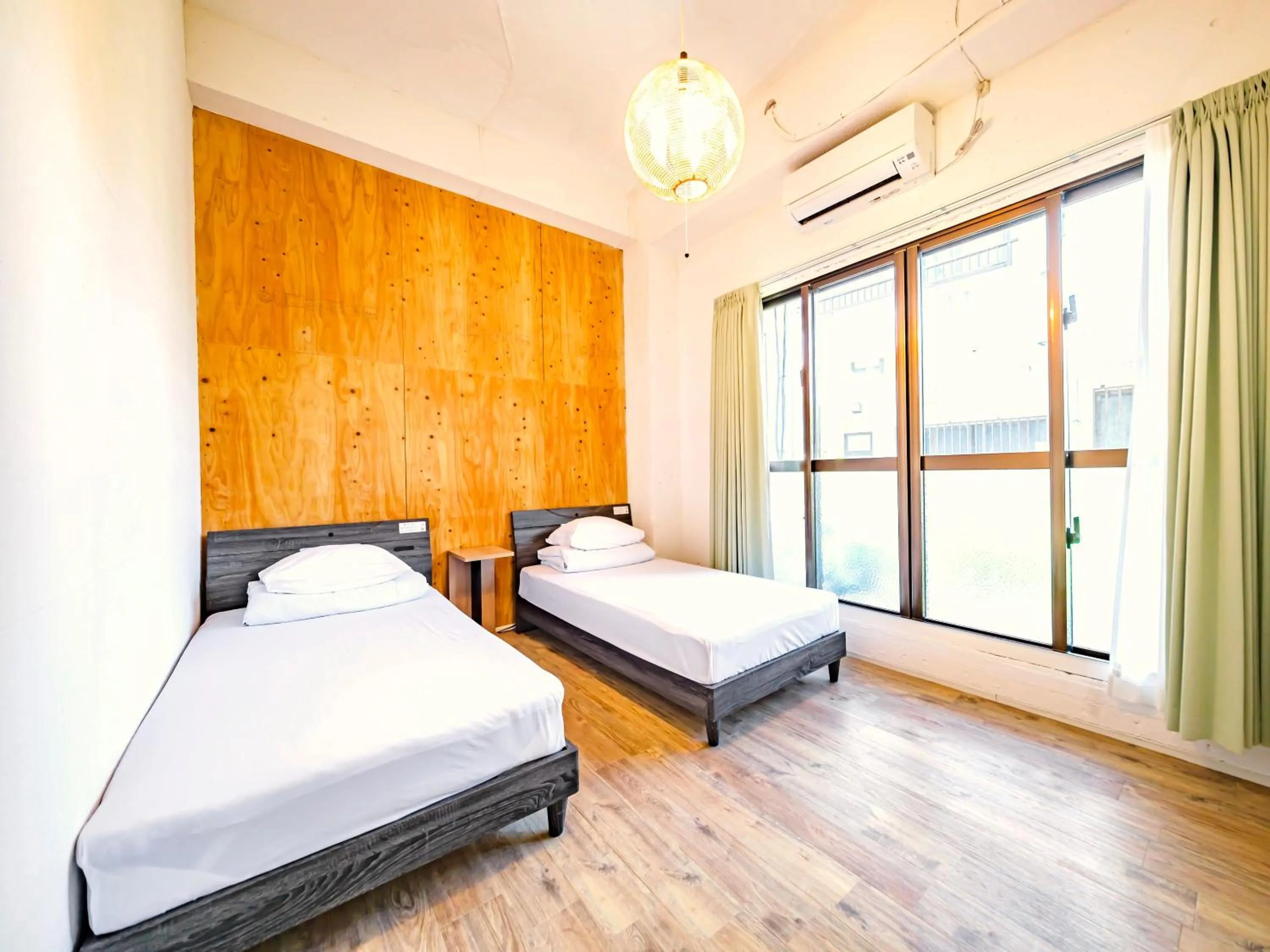 Bed in 宮古島 Guesthouse Re-Spect