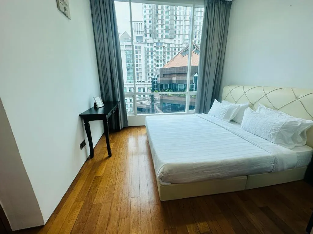 Bed in Vortex Suites KLCC by NADIA