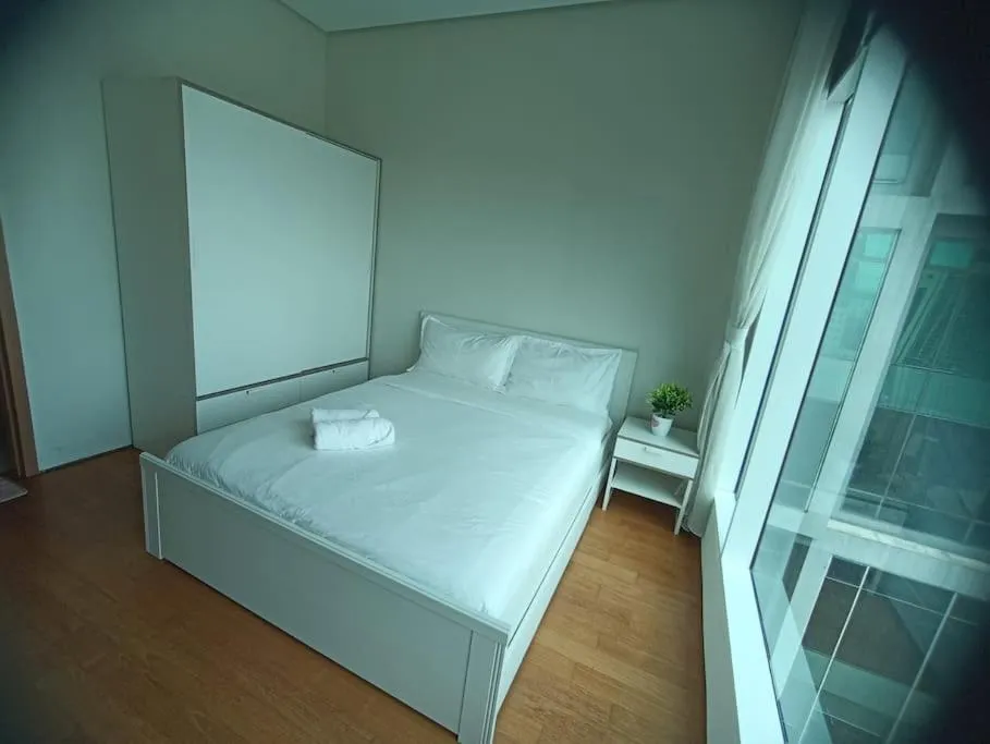 Bed in Vortex Suites KLCC by NADIA
