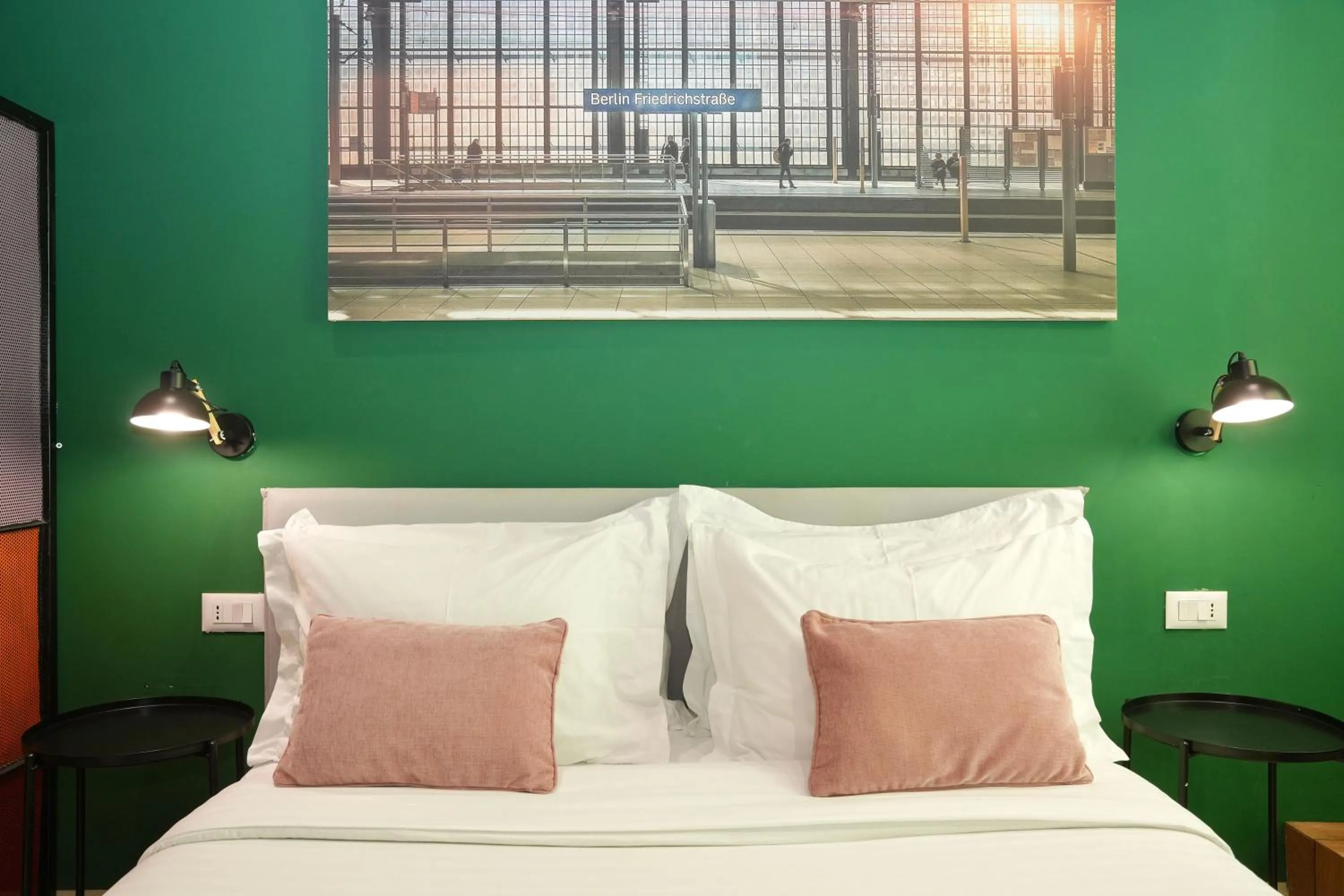 Bed in Ambassador Skyline Apartments