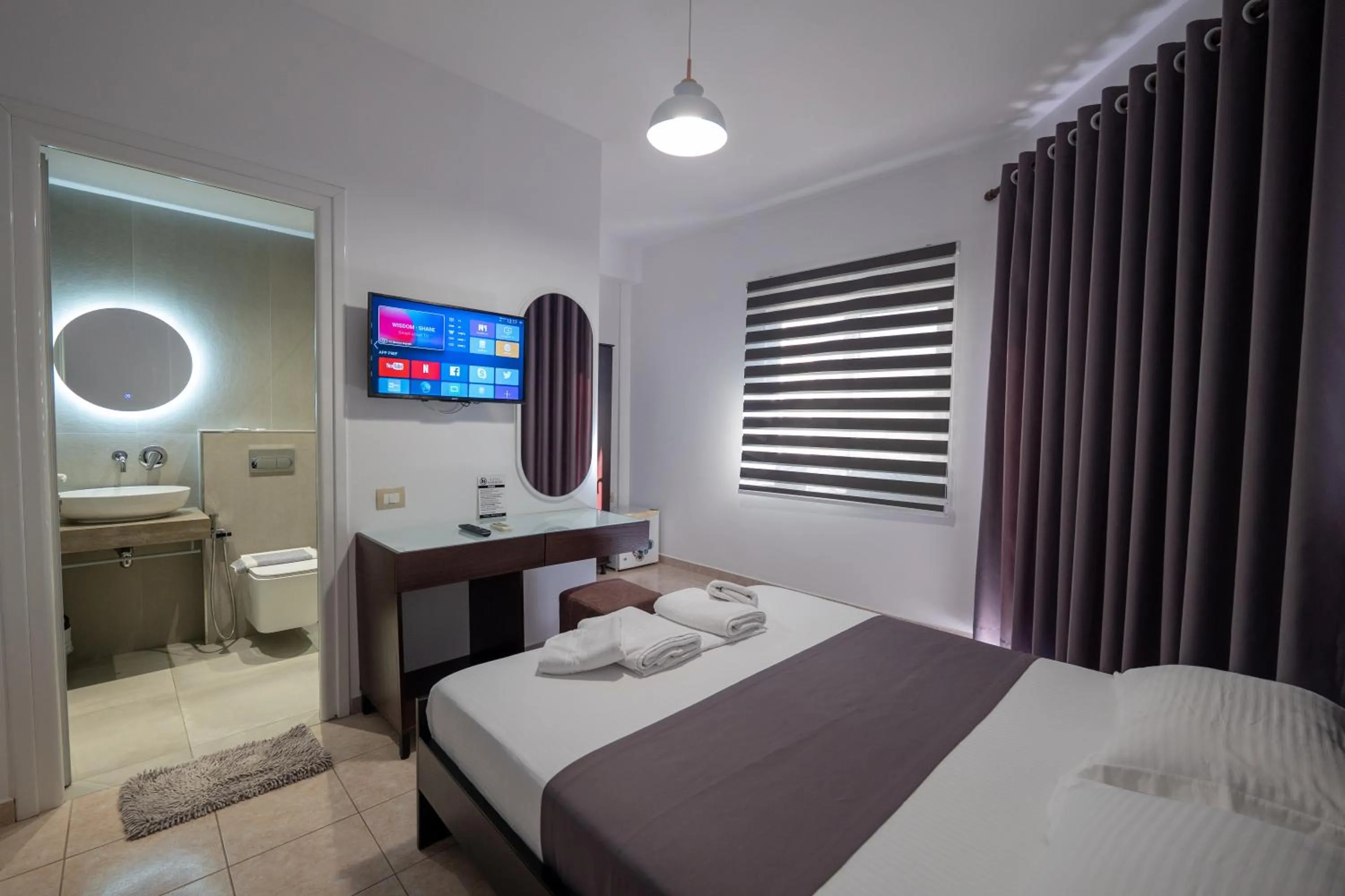 TV and multimedia, Bed in Mariksel HOTEL
