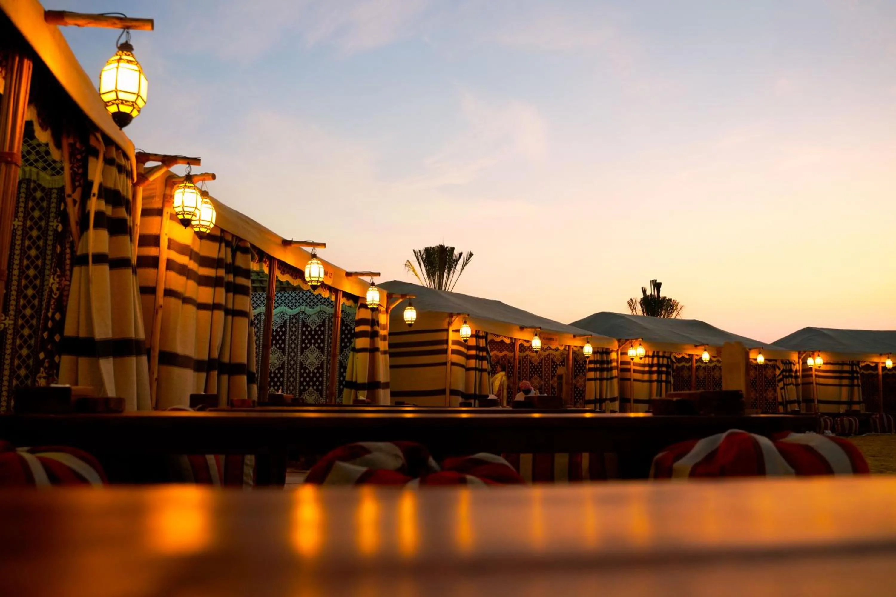 Sunset in Al Khayma Camp "Elite Glamping & Dining in Experience"