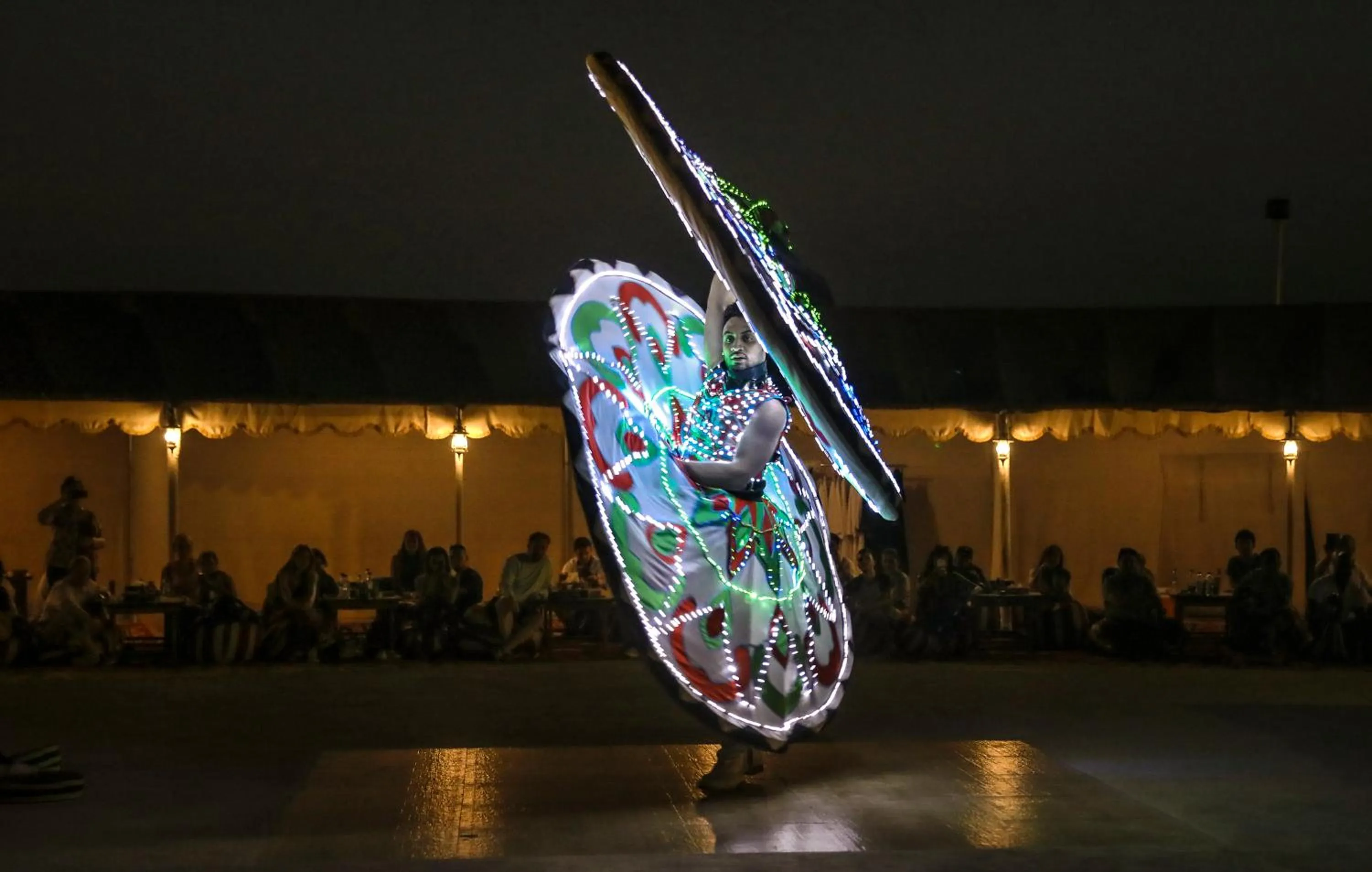 Evening entertainment in Al Khayma Camp "Elite Glamping & Dining in Experience"