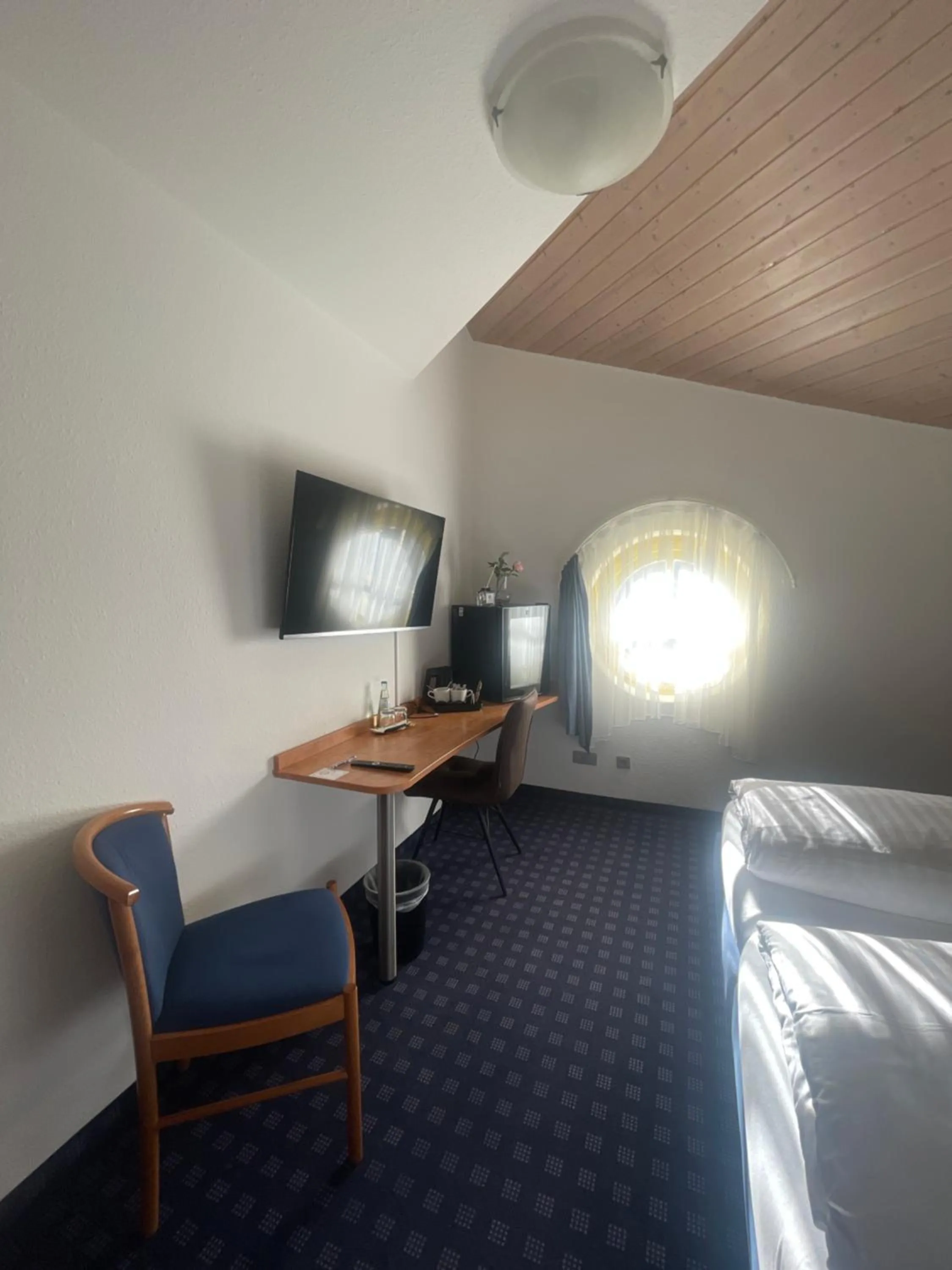 Bed in KRYSTALL Hotel