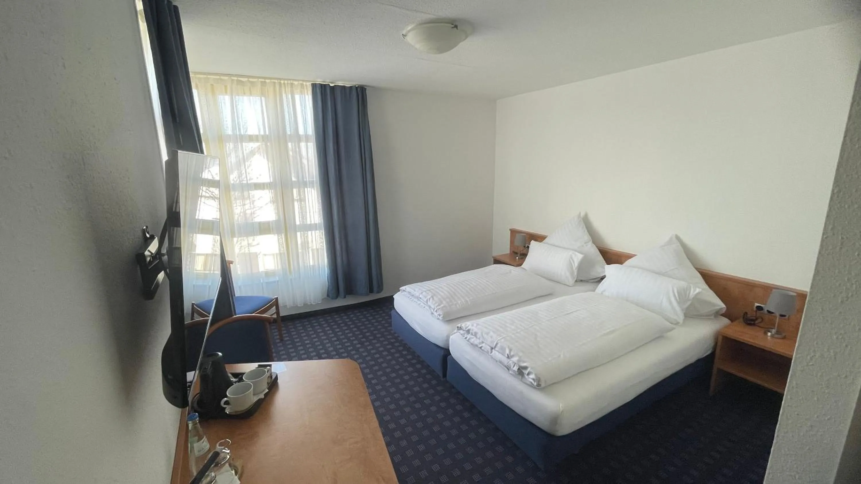 Bed in KRYSTALL Hotel