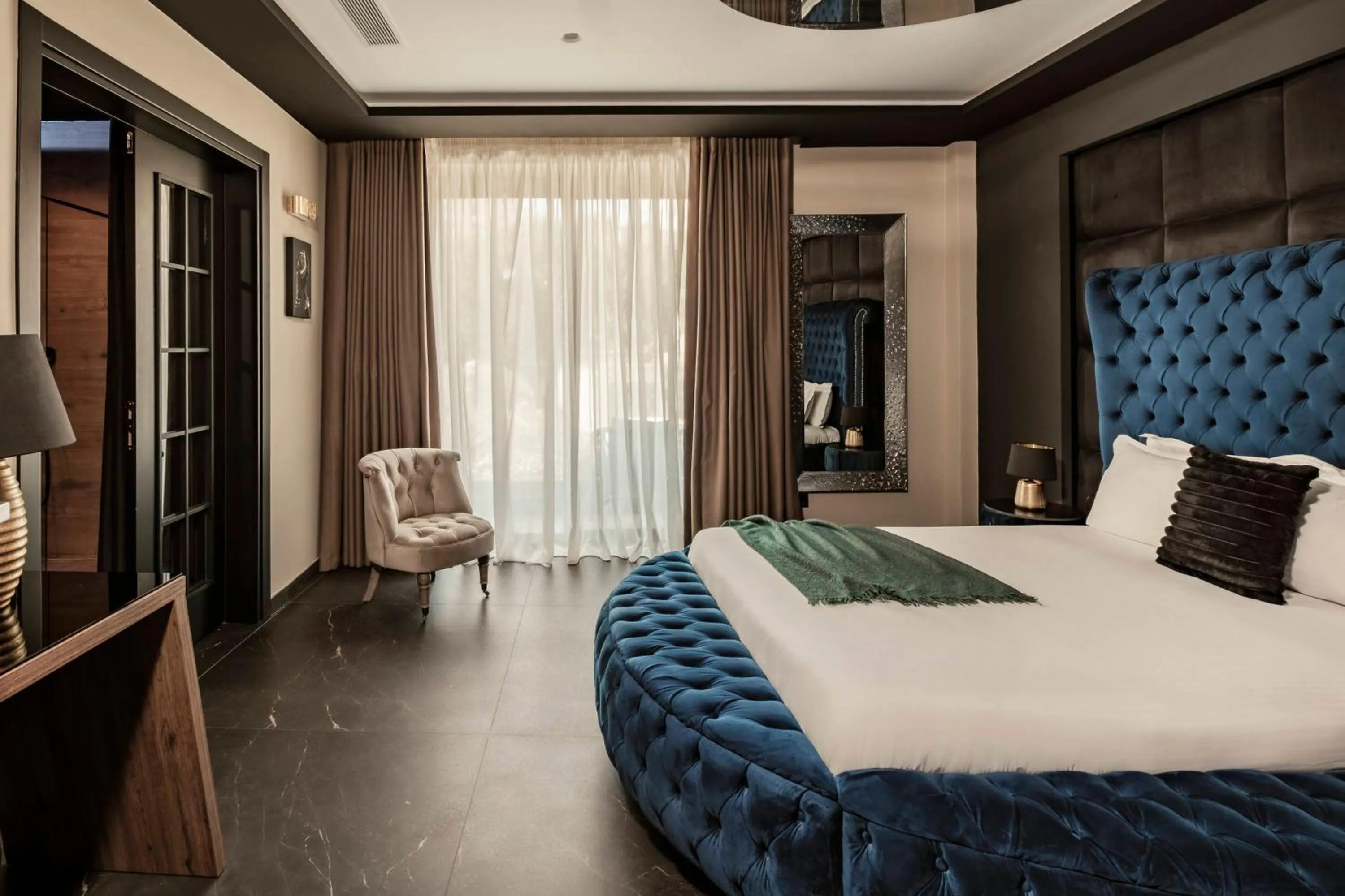 Seating area, Bed in Damare Resort & SPA